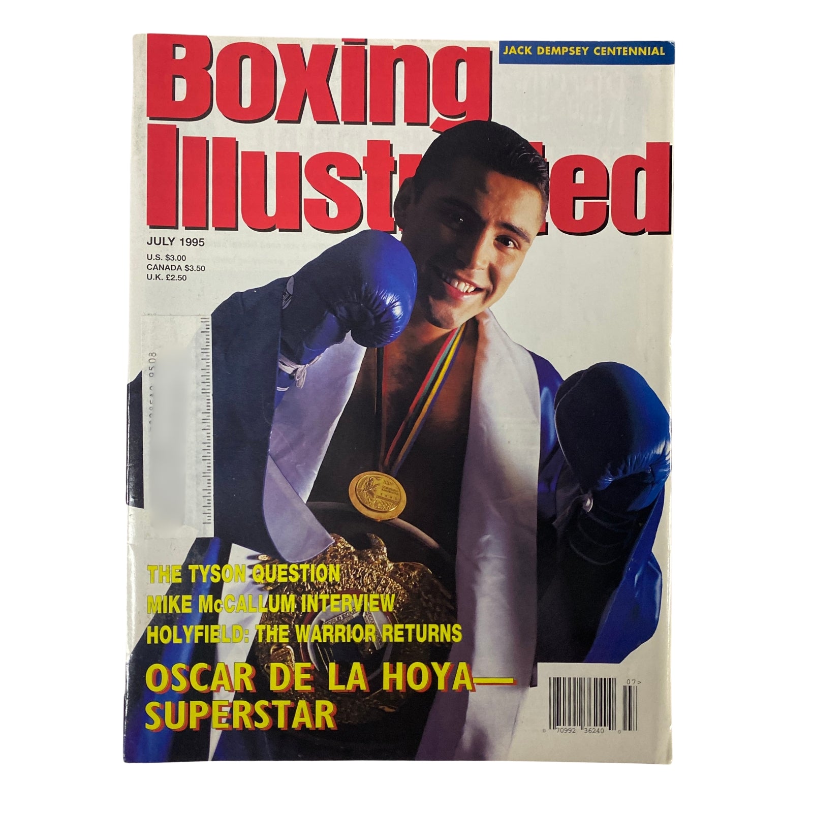 Boxing Illustrated Magazine July 1995 featuring Oscar De La Hoya on the cover, highlighting his achievements with boxing gloves and a championship medal.