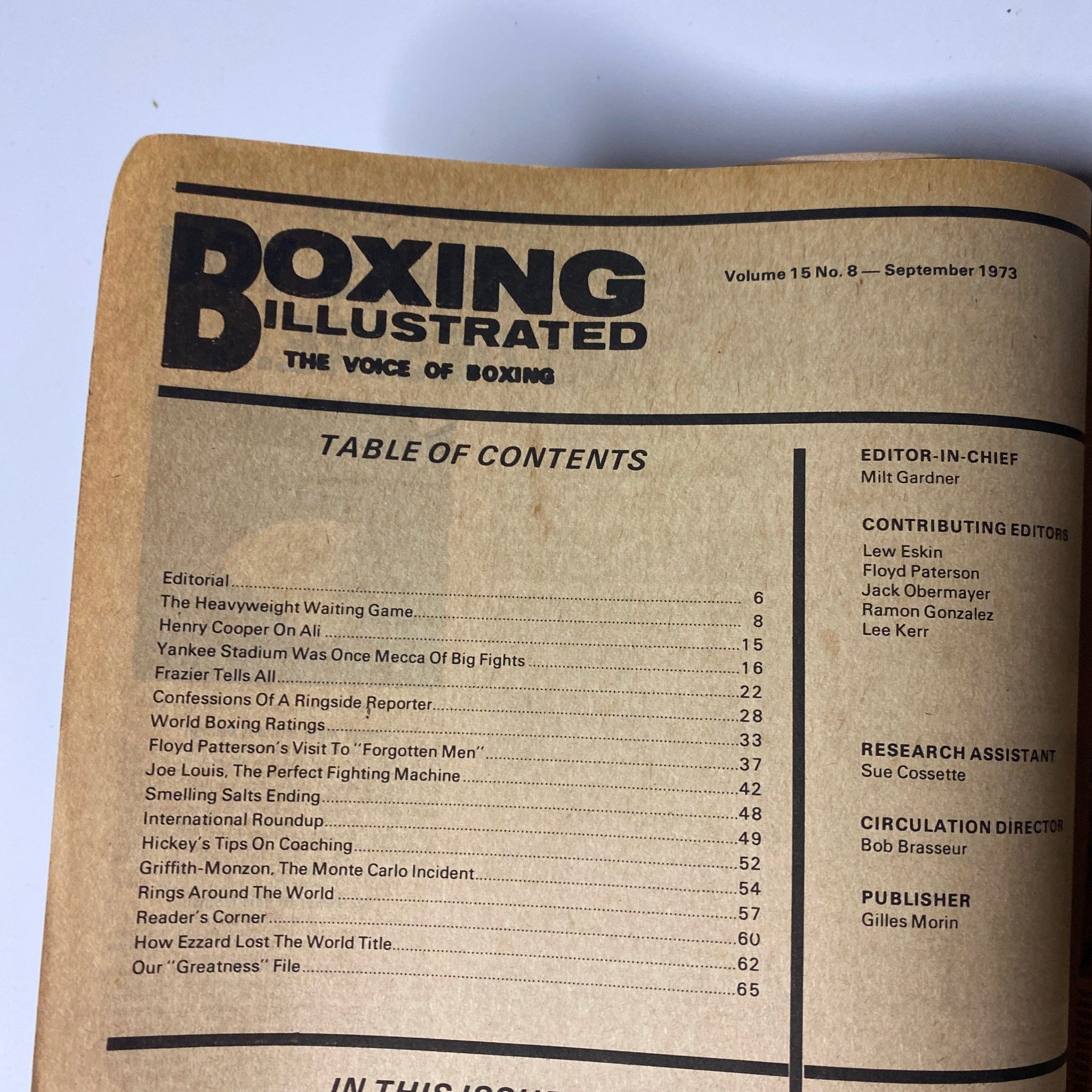 Table of Contents page from Boxing Illustrated Magazine, September 1973, featuring sections on heavyweight boxing, editorial insights, and notable articles including ‘The Heavyweight Waiting Game’ and ‘Joe Louis: The Perfect Fighting Machine’. This vintage magazine is a must-have for boxing enthusiasts.