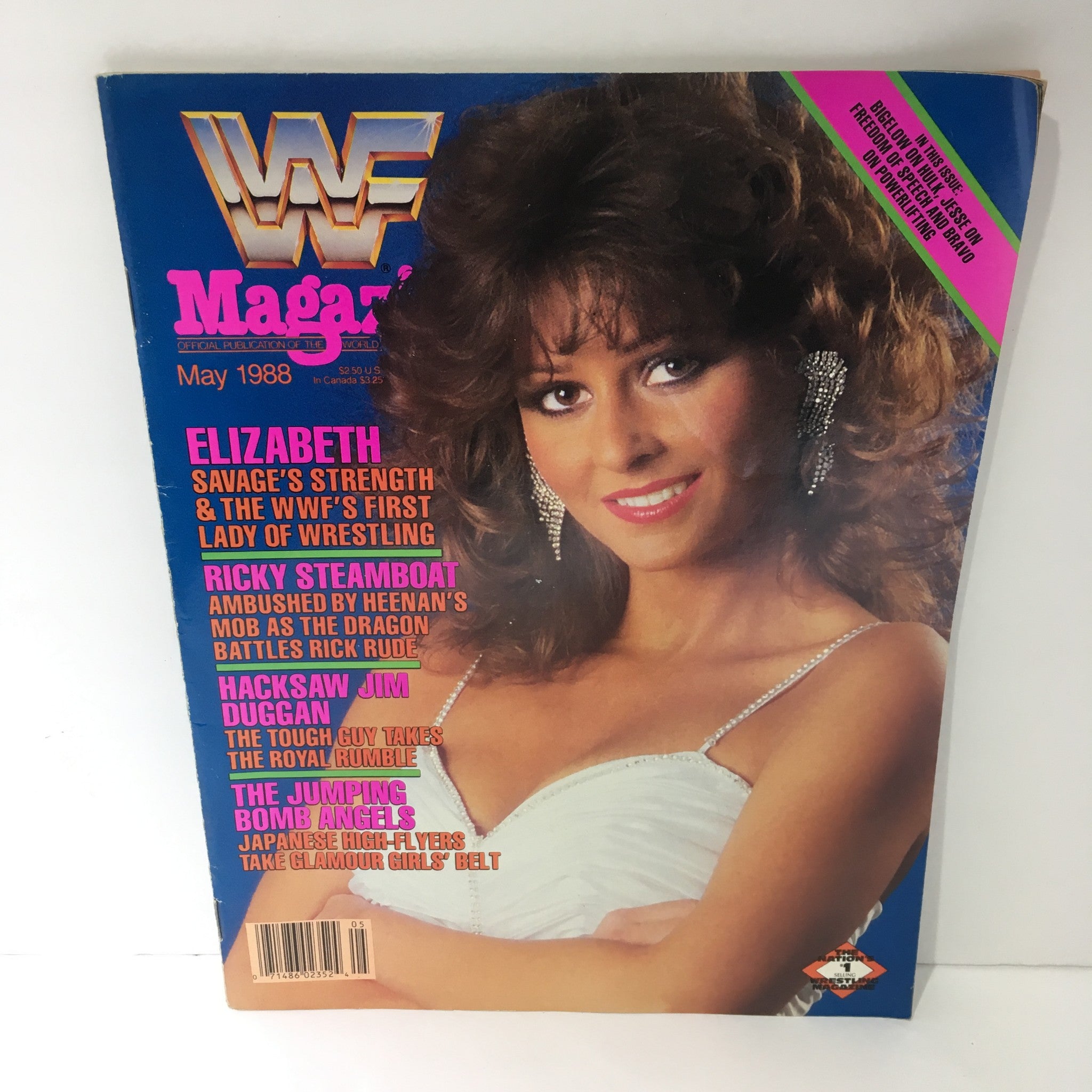 WWF Magazine: Elizabeth - WWF's First Lady of Wrestling, May 1988. Cover featuring a portrait of Elizabeth, showcasing her iconic beauty and style, with highlighted articles related to wrestling history, including Ricky Steamboat and Hacksaw Jim Duggan.