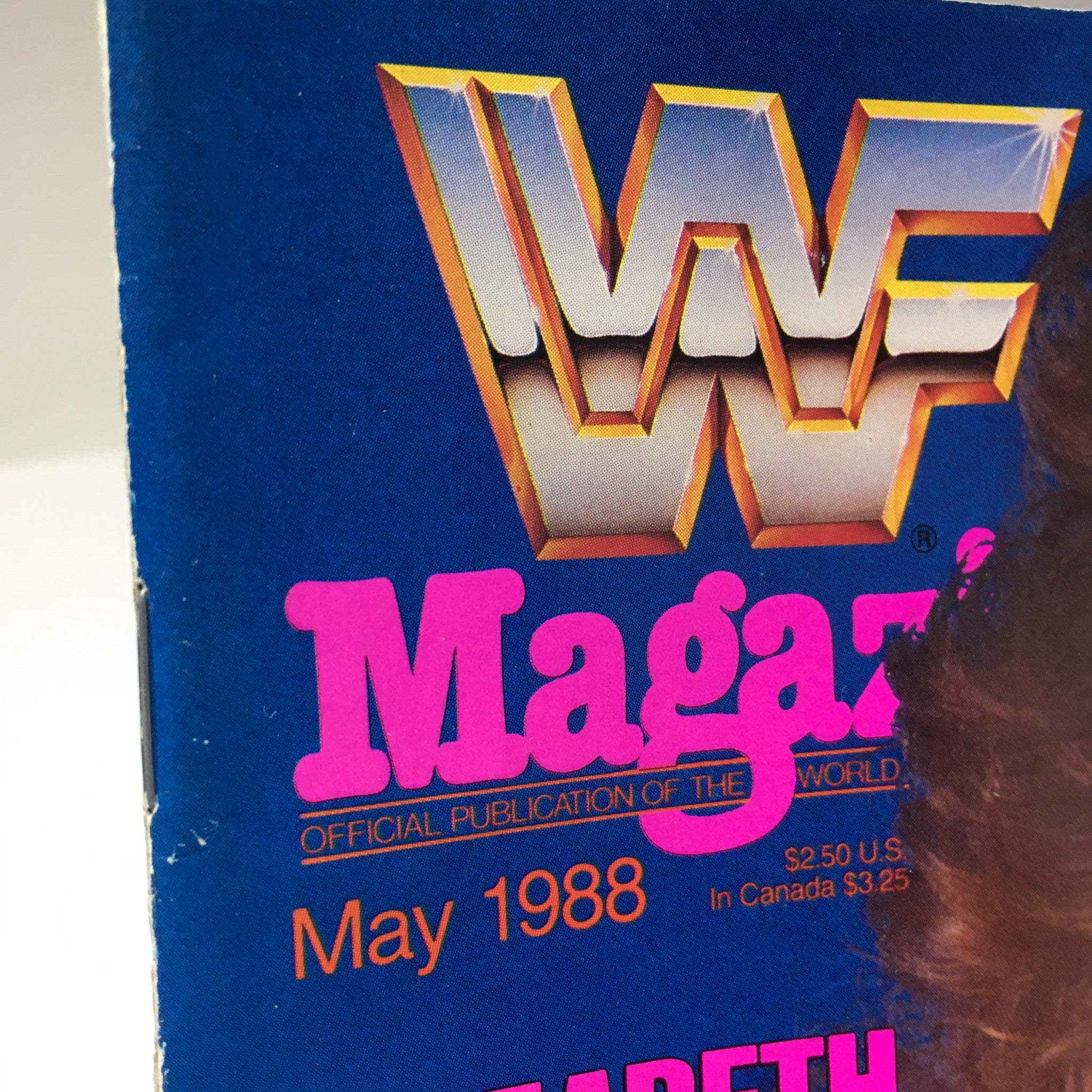 Cover of WWF Magazine featuring Elizabeth, WWF's First Lady of Wrestling, May 1988 issue, showcasing the iconic WWF logo and vibrant colors.