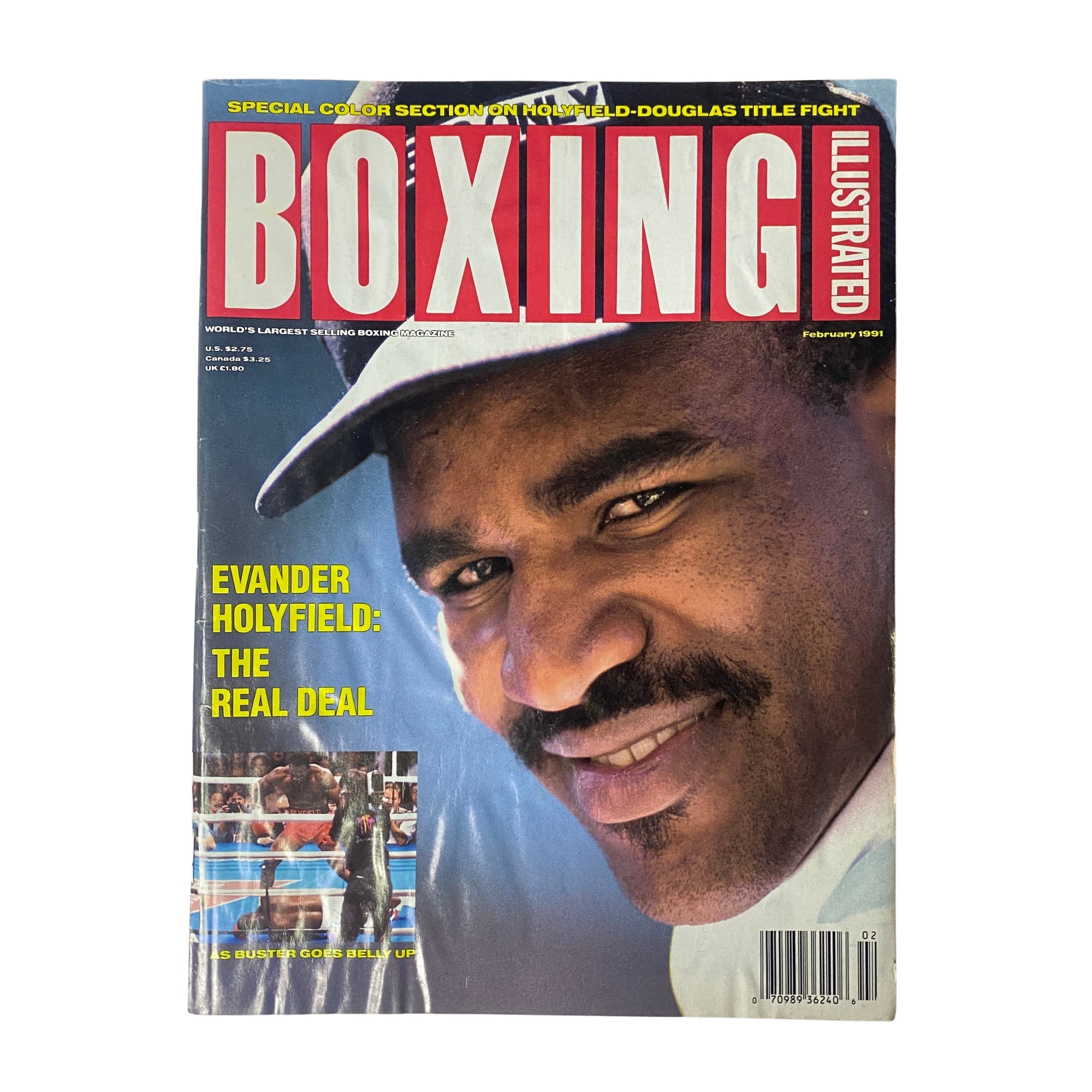 Boxing Illustrated Magazine February 1991 featuring Evander Holyfield on the cover with the caption 'The Real Deal'. A collectible issue highlighting Holyfield's victory over Buster Douglas.