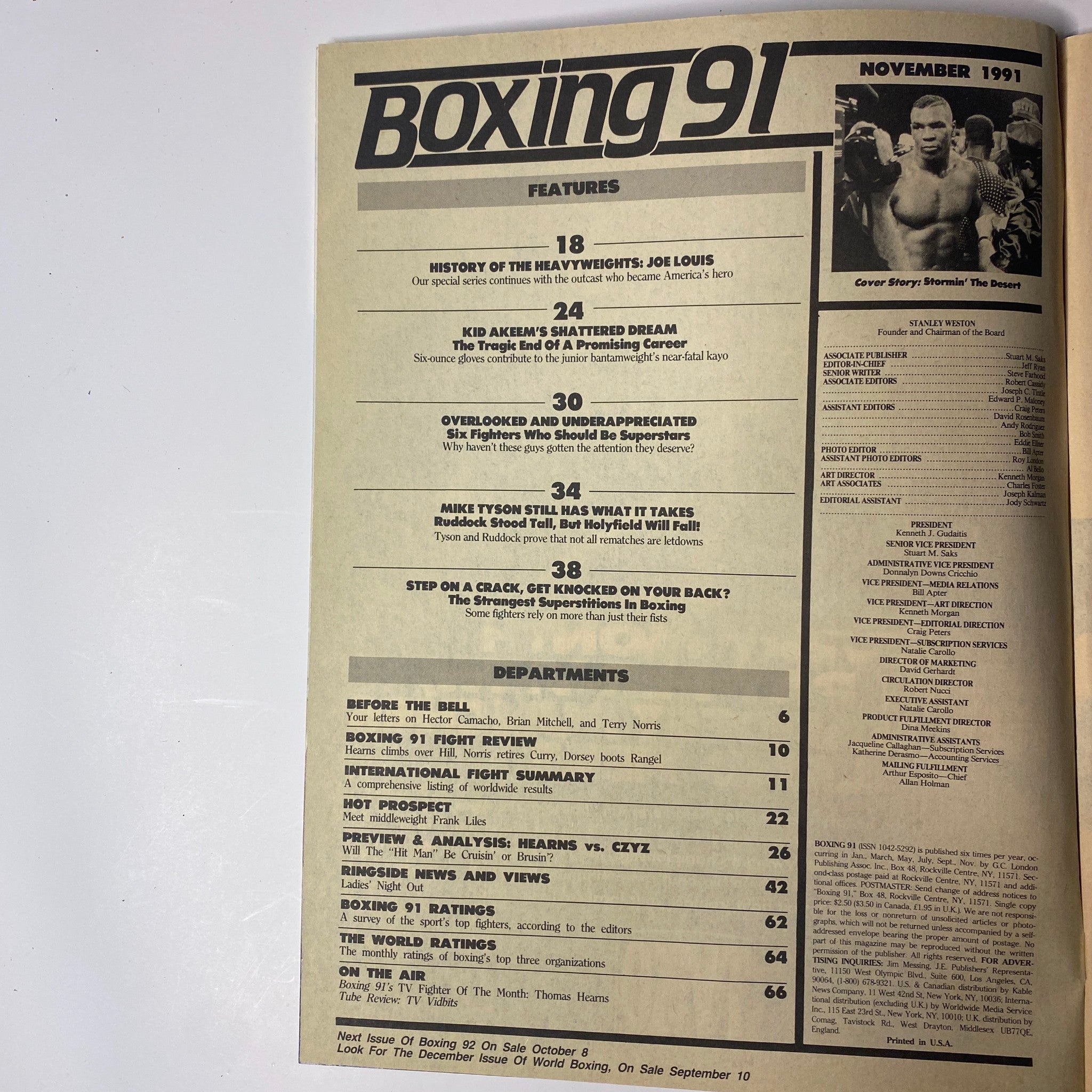 Interior page of Boxing 91 Magazine November 1991 outlining features including a tribute to Joe Louis and articles on boxing tragedies and superstitions, part of the magazine's in-depth examination of heavyweight boxing.
