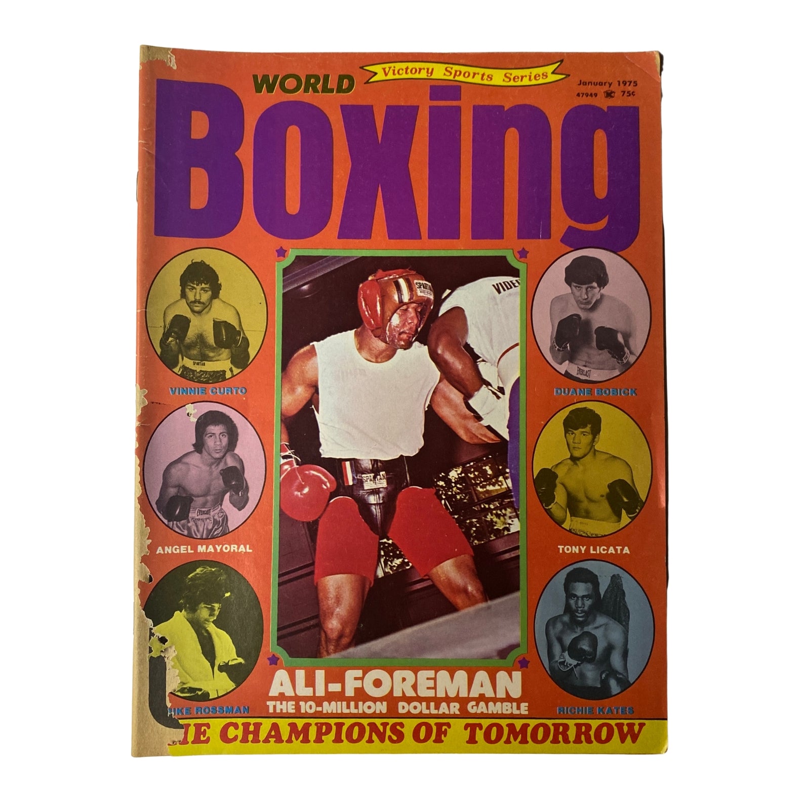 Cover of World Boxing Magazine January 1975 featuring George Foreman vs. Muhammad Ali, showcasing vibrant colors and title graphics.