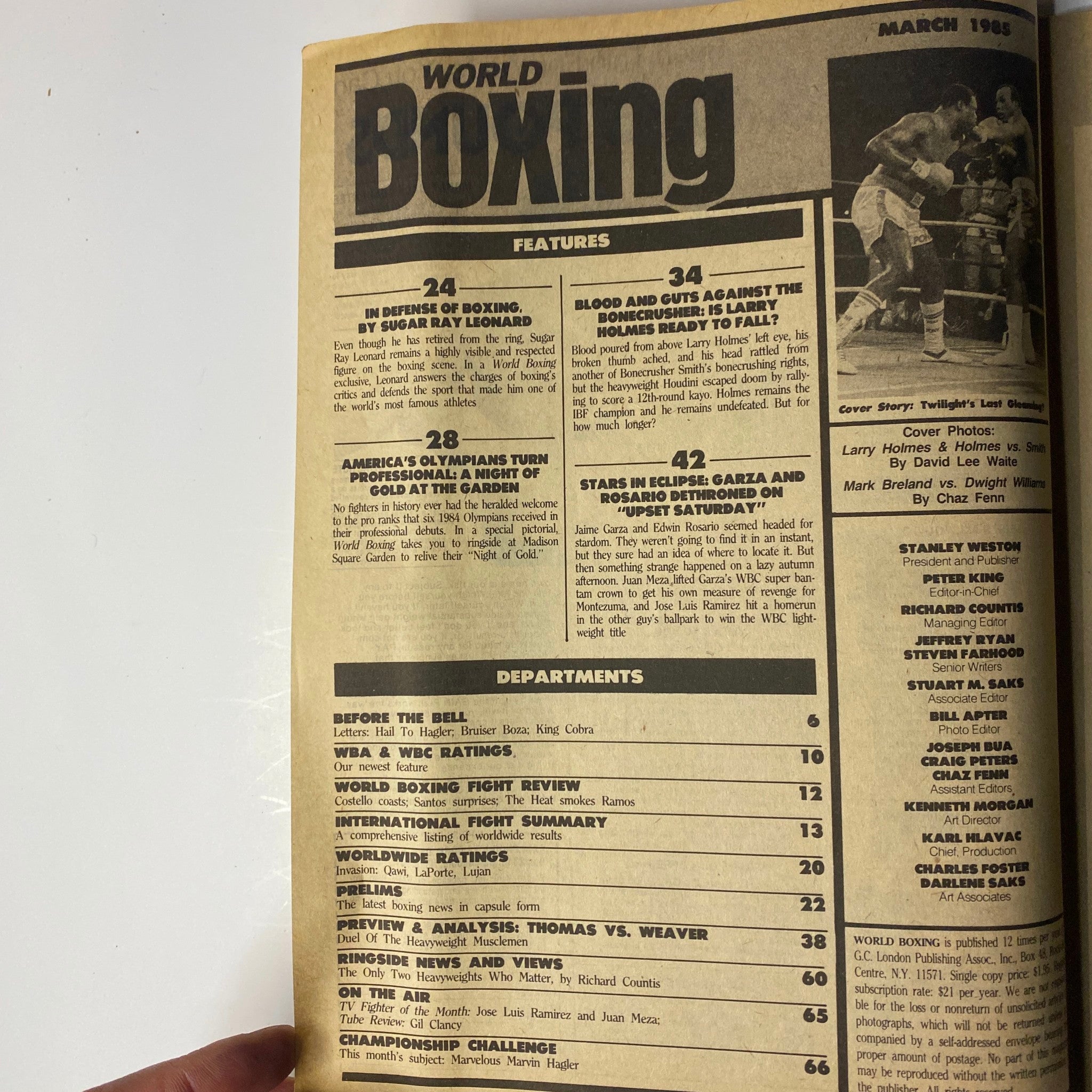 Inside page of World Boxing Magazine March 1985 detailing features and departments, including coverage of Larry Holmes and Pinklon Thomas.
