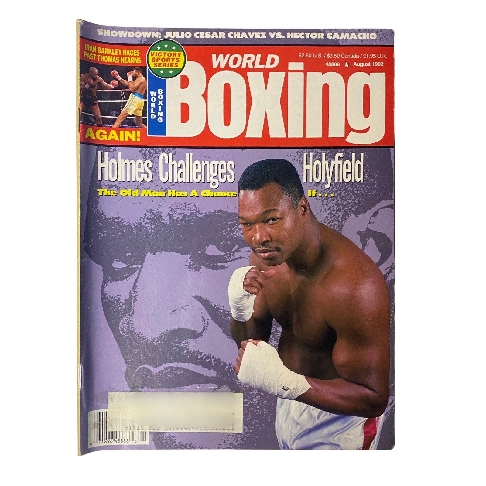 Cover of World Boxing Magazine August 1992 featuring Evander Holyfield vs. Larry Holmes, with an emphasis on Holmes challenging Holyfield. The magazine is a vintage collectible in very good condition.