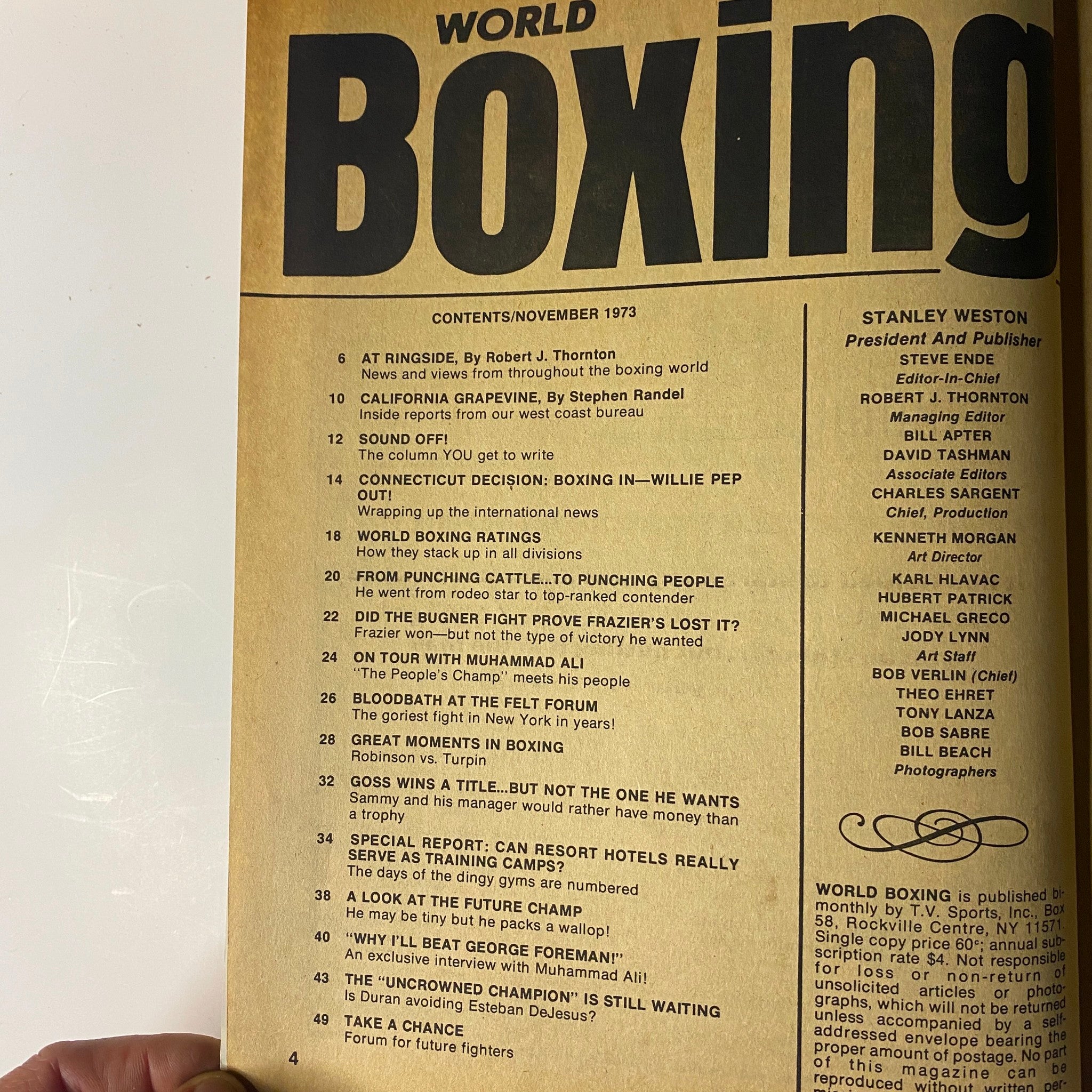 Contents page of World Boxing Magazine, November 1973, listing articles such as 'At Ringside', 'California Grapevine', and 'Sound Off!'. The magazine features notable pieces on Muhammad Ali's boxing career and insights from the era.