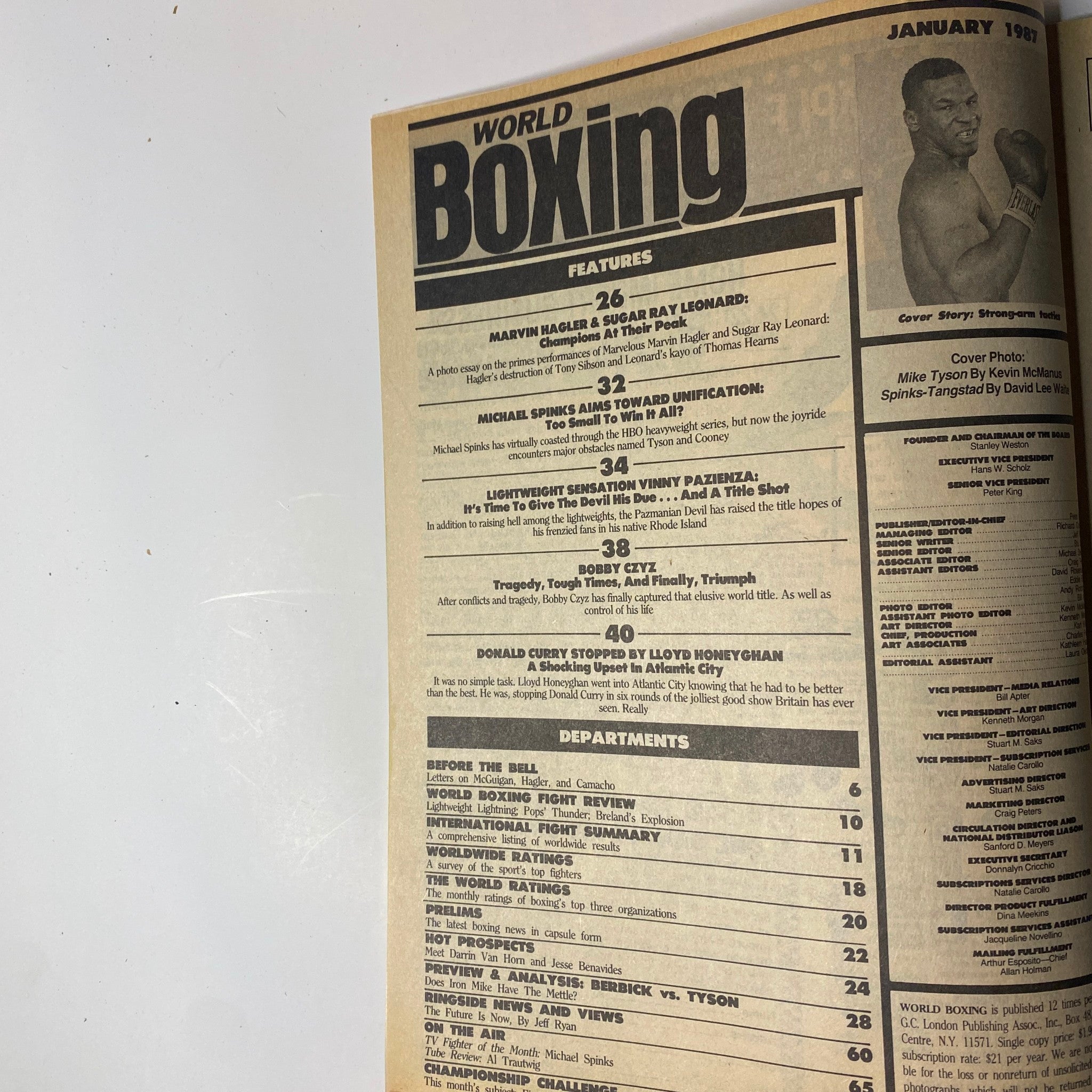 Inside page of World Boxing Magazine January 1987 listing featured articles including Marvin Hagler, Sugar Ray Leonard, and Michael Spinks, with details on boxing events and fighters.