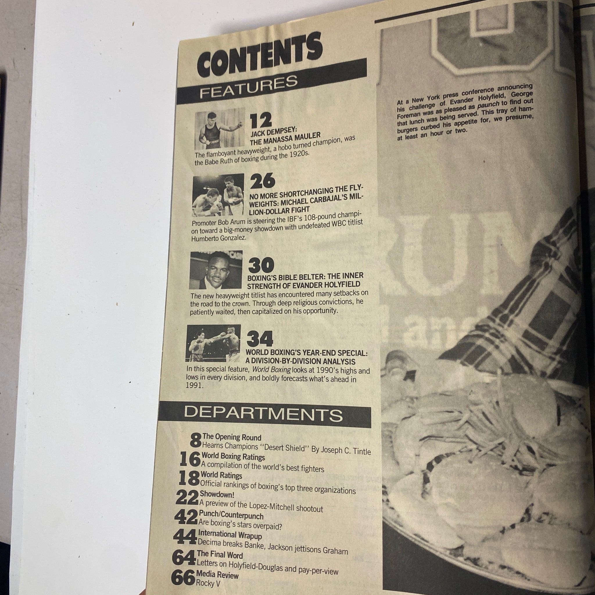 Contents page from the April 1991 issue of World Boxing Magazine featuring Evander Holyfield on the cover, listing articles including Jack Dempsey, Michael Carbajal's significant fight, and features on Holyfield's inner strength and a year-end boxing analysis.