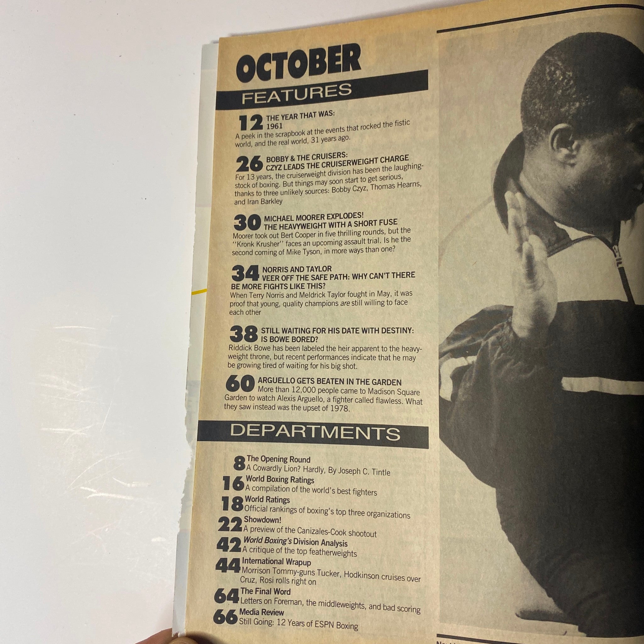 Contents page of World Boxing Magazine, October 1992, listing features such as 'The Year That Was: 1961', 'Michael Moorer Explodes!', and 'Still Waiting for His Date with Destiny: Is Bowe Bored?' along with departmental sections.