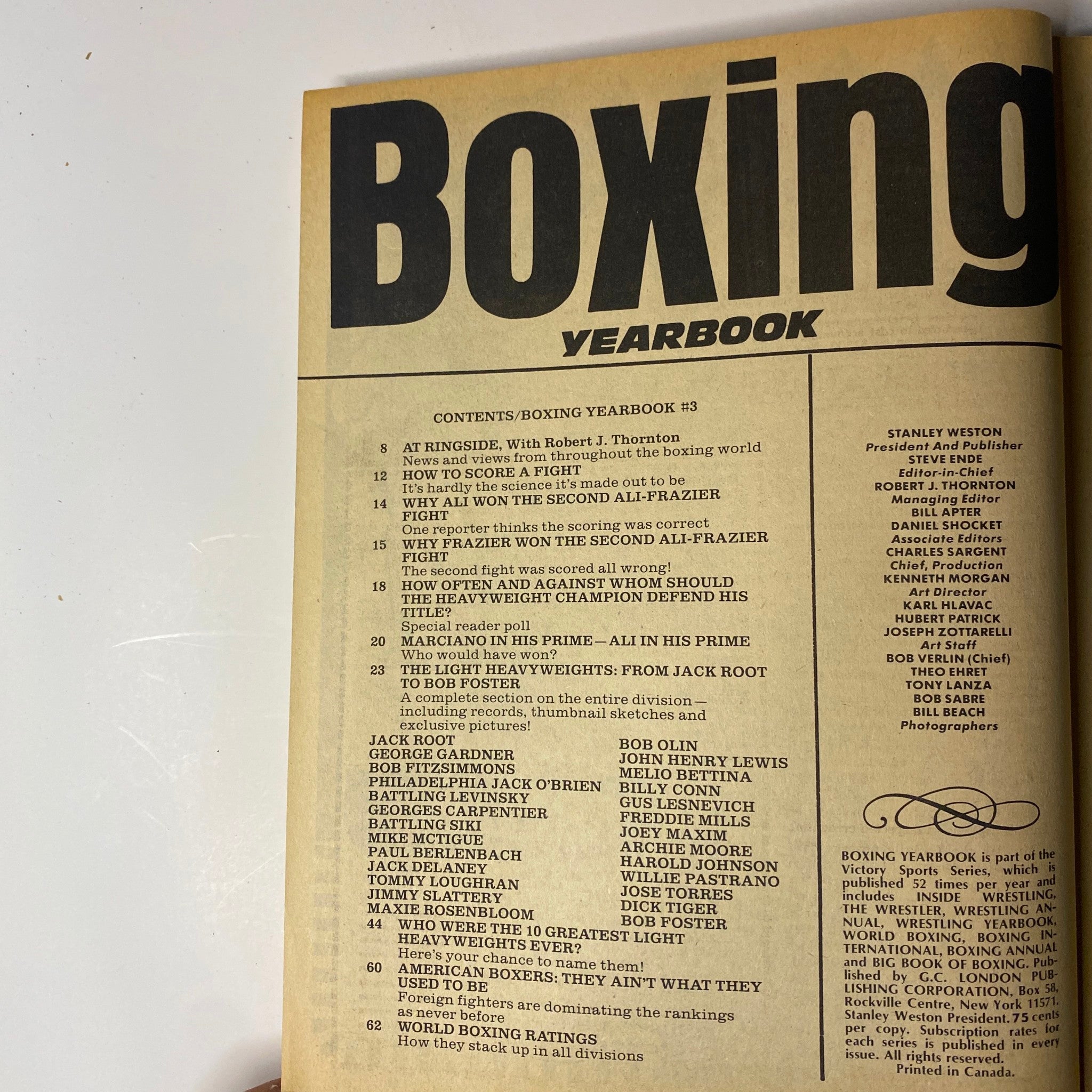 Interior page of 'Boxing 1974 Annual Yearbook Magazine' with the table of contents, detailing articles and features related to the boxing world, including notable matches and champions.