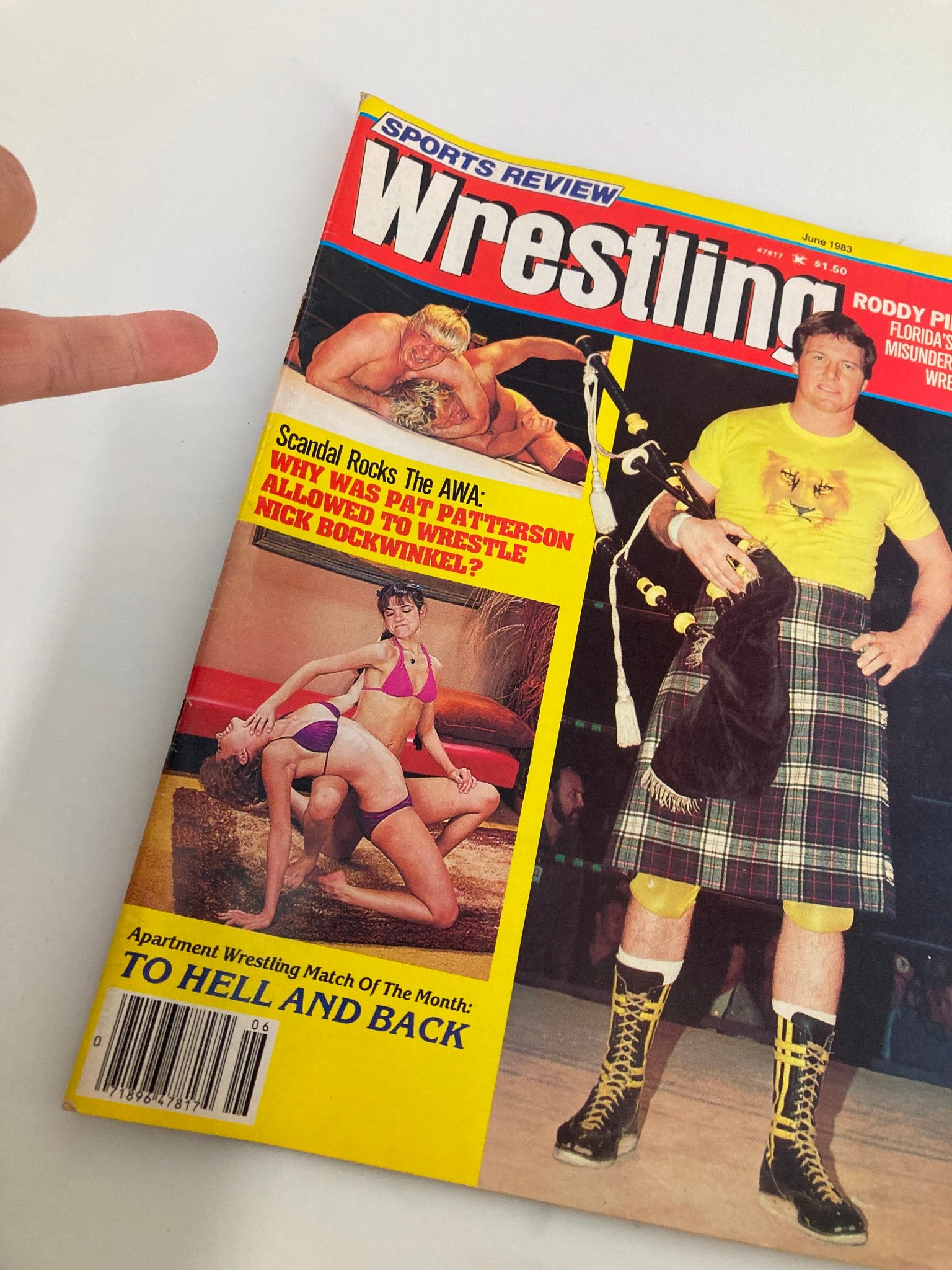 Close-up view of the cover of VTG Sports Review Wrestling Magazine June 1983, showcasing Roddy Piper and a provocative wrestling-themed article. The magazine is titled 'Roddy Piper: Florida's Most Misunderstood Wrestler'.