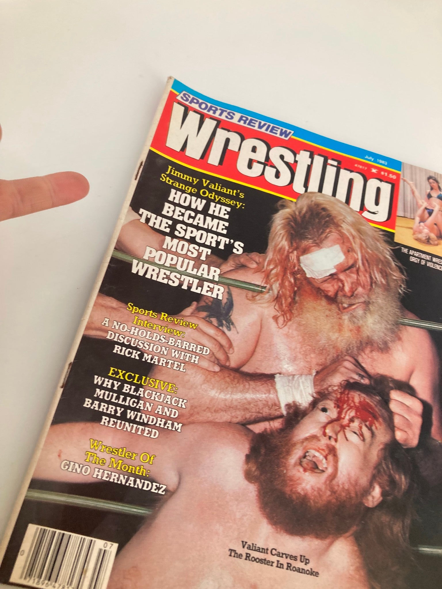 Cover of VTG Sports Review Wrestling July 1983 featuring Jimmy Valiant and Oliver Humperdink, highlighting an article about Valiant's journey to becoming a popular wrestler.