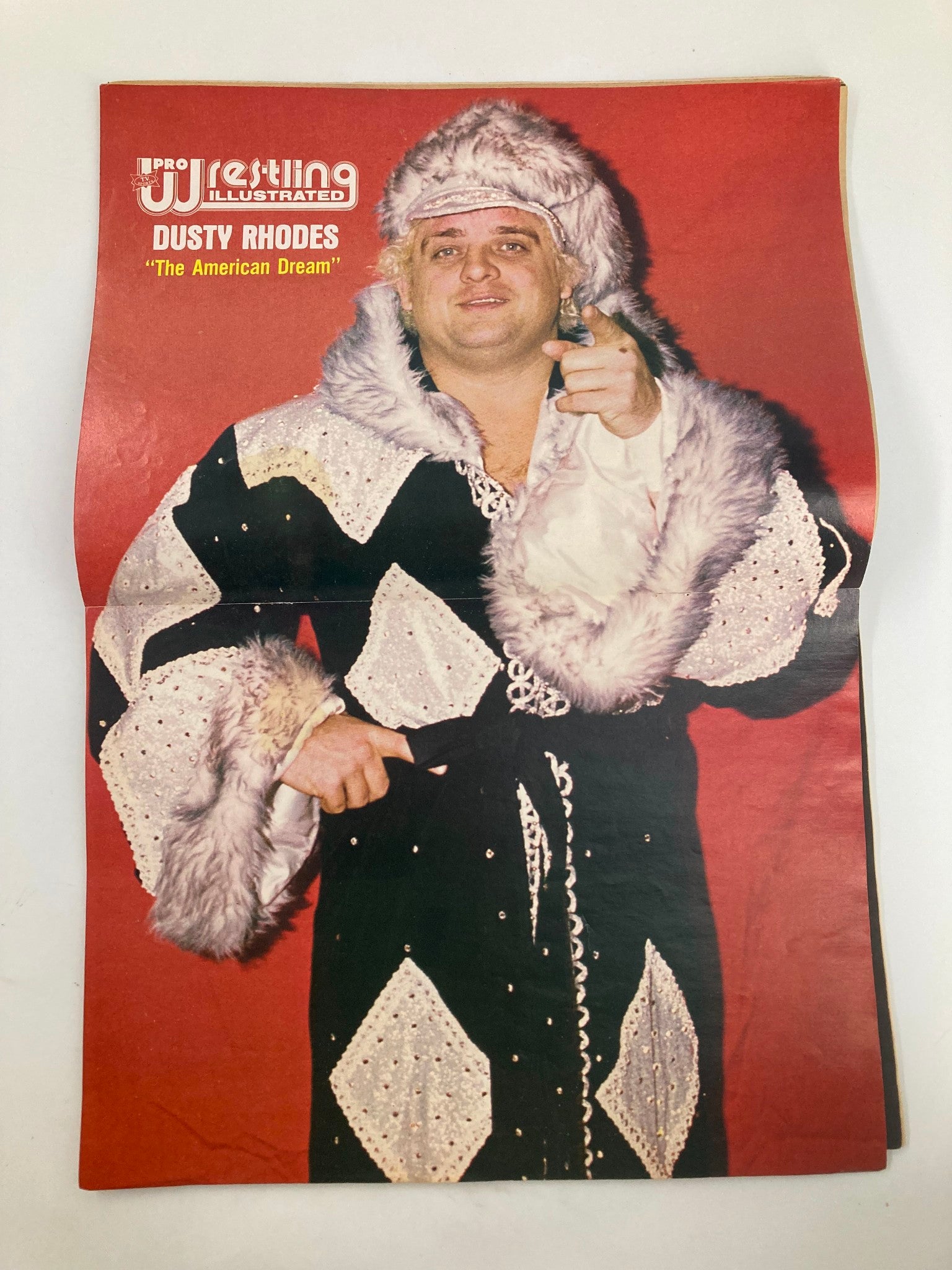 Inside page of Pro Wrestling Illustrated Magazine showcasing Dusty Rhodes, titled 'The American Dream', capturing the essence of wrestling legends.