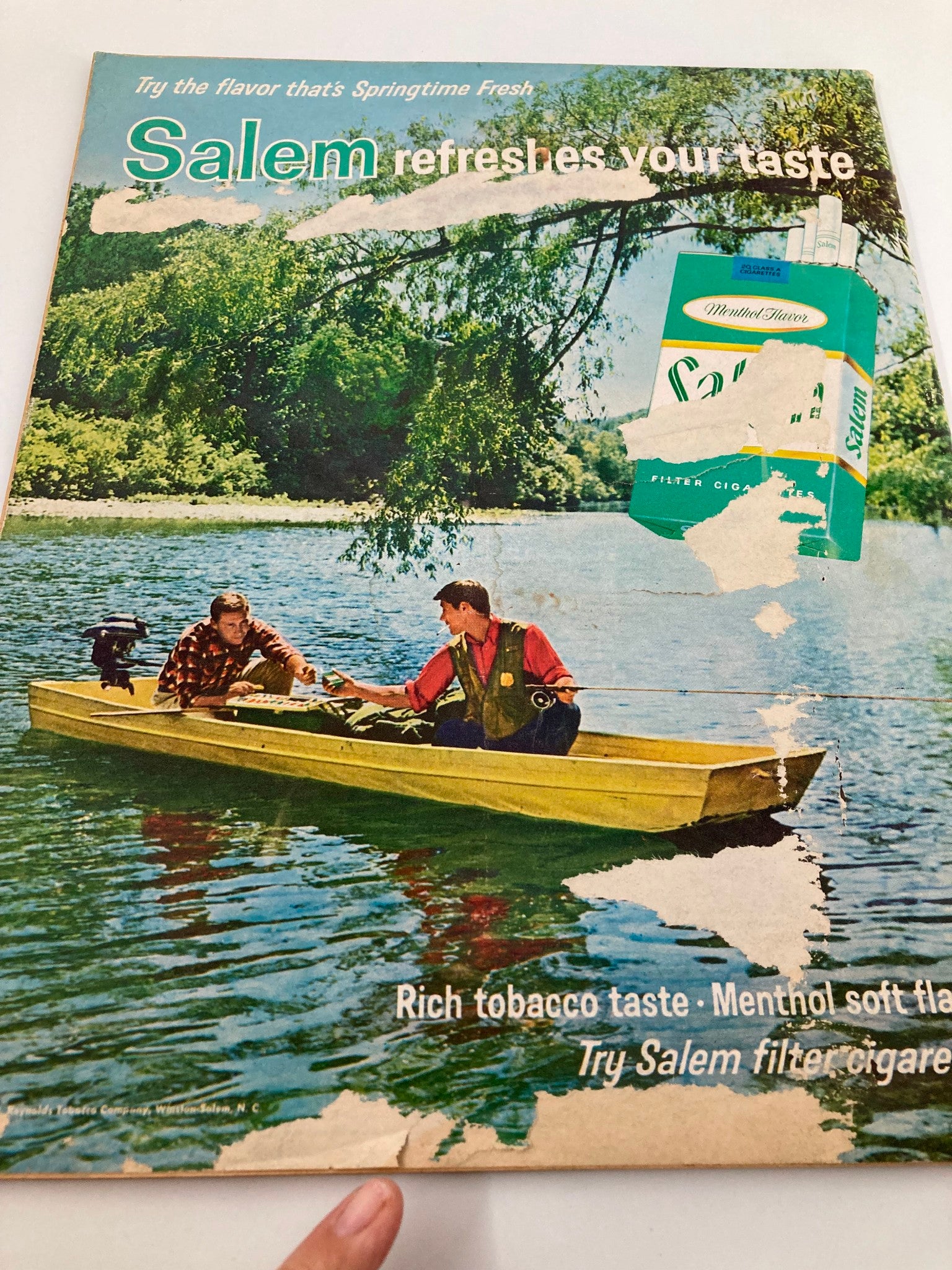 Vintage advertisement from a magazine depicting fishermen in a canoe, promoting Salem menthol cigarettes, contrasting with the agricultural theme of VTG The Progressive Farmer Magazine December 1966.
