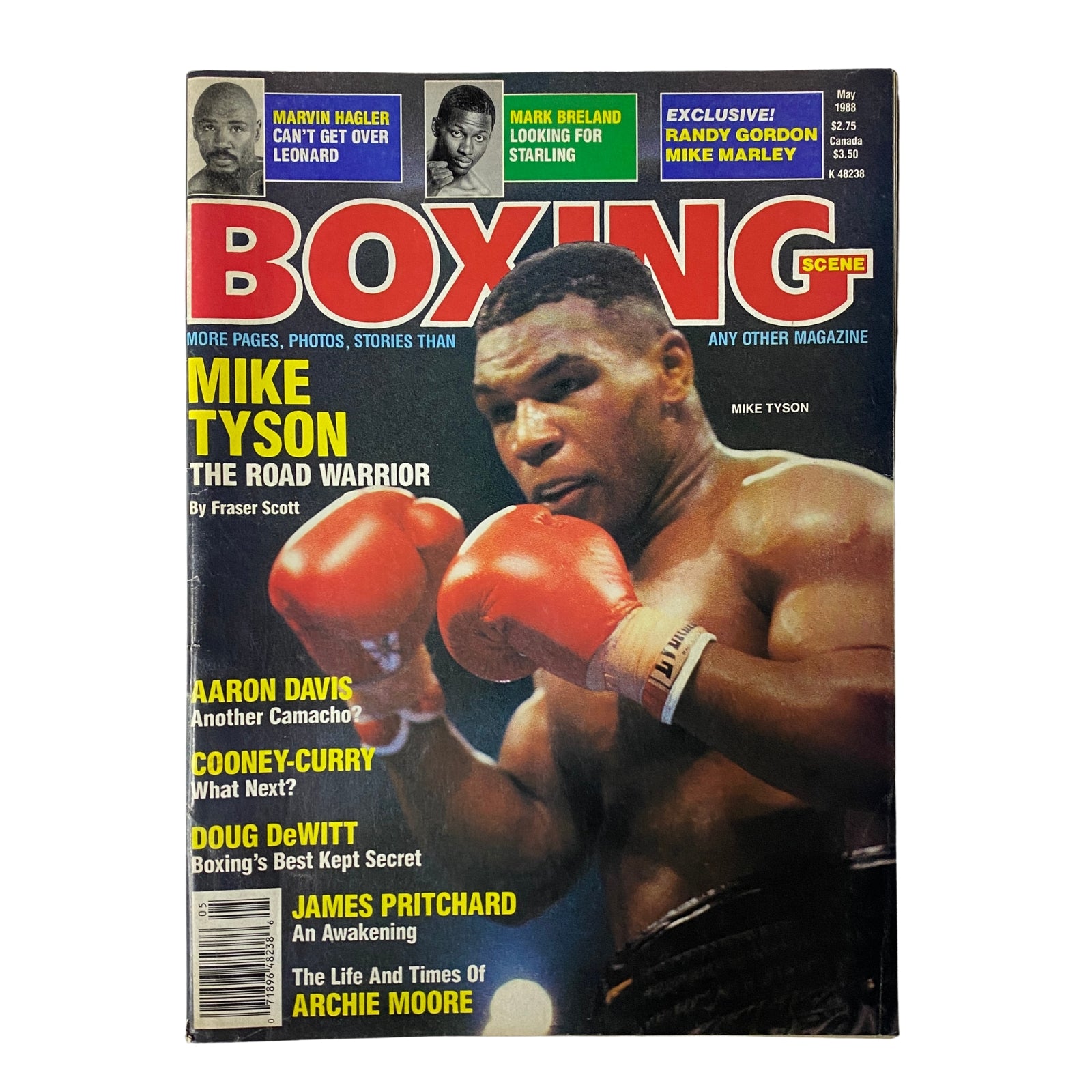 Cover of Boxing Scene Magazine May 1988 featuring Mike Tyson, titled 'Mike Tyson: The Road Warrior' by Fraser Scott, showcasing boxing highlights and articles.