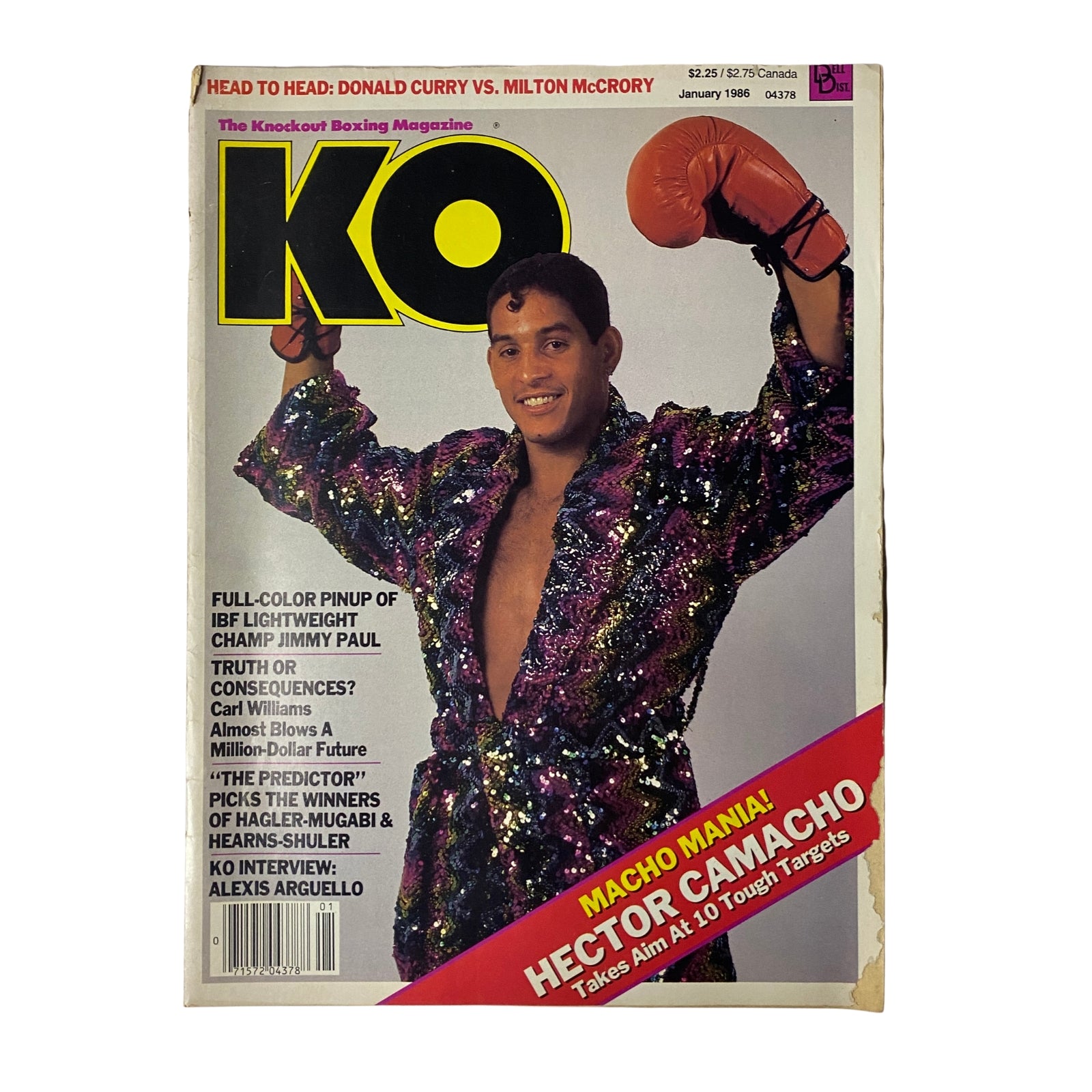 KO Boxing Magazine January 1986 featuring Hector Camacho on the cover, showcasing his flamboyant style in a sparkly outfit. Highlights include articles on boxing legends, expert analysis, and the rise of Camacho as a boxing personality.