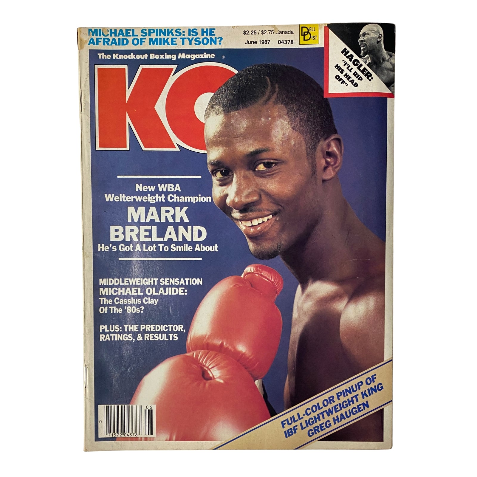 KO Boxing Magazine June 1987 featuring Mark Breland on the cover, depicting him as the new WBA Welterweight Champion with a red boxing glove. The magazine highlights Breland’s triumph and includes features on Michael Olajide and Marvin Hagler.