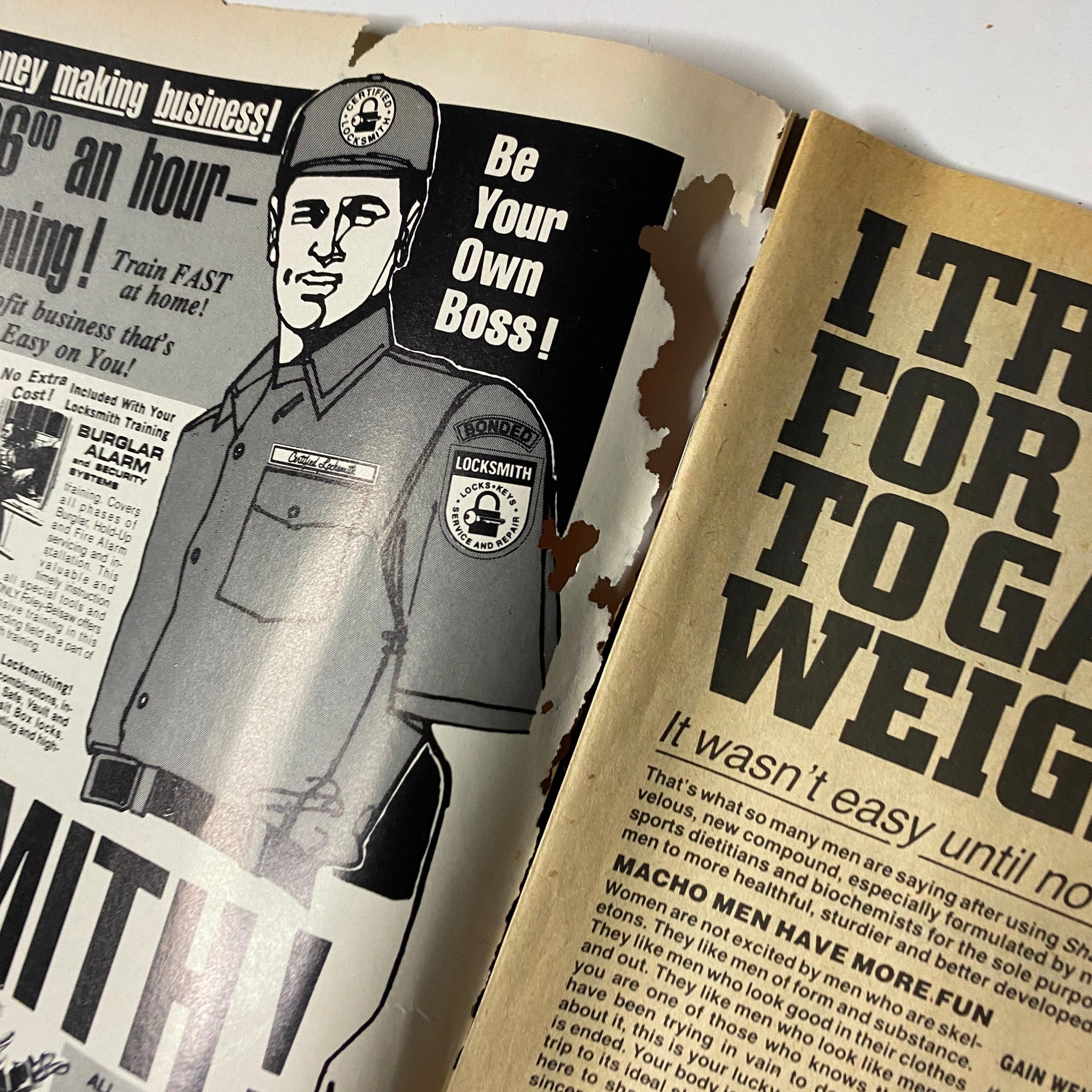 Inside page of KO Boxing Magazine May 1986 with a damaged advertisement, promoting locksmith training, emphasizing the financial opportunities of becoming your own boss.