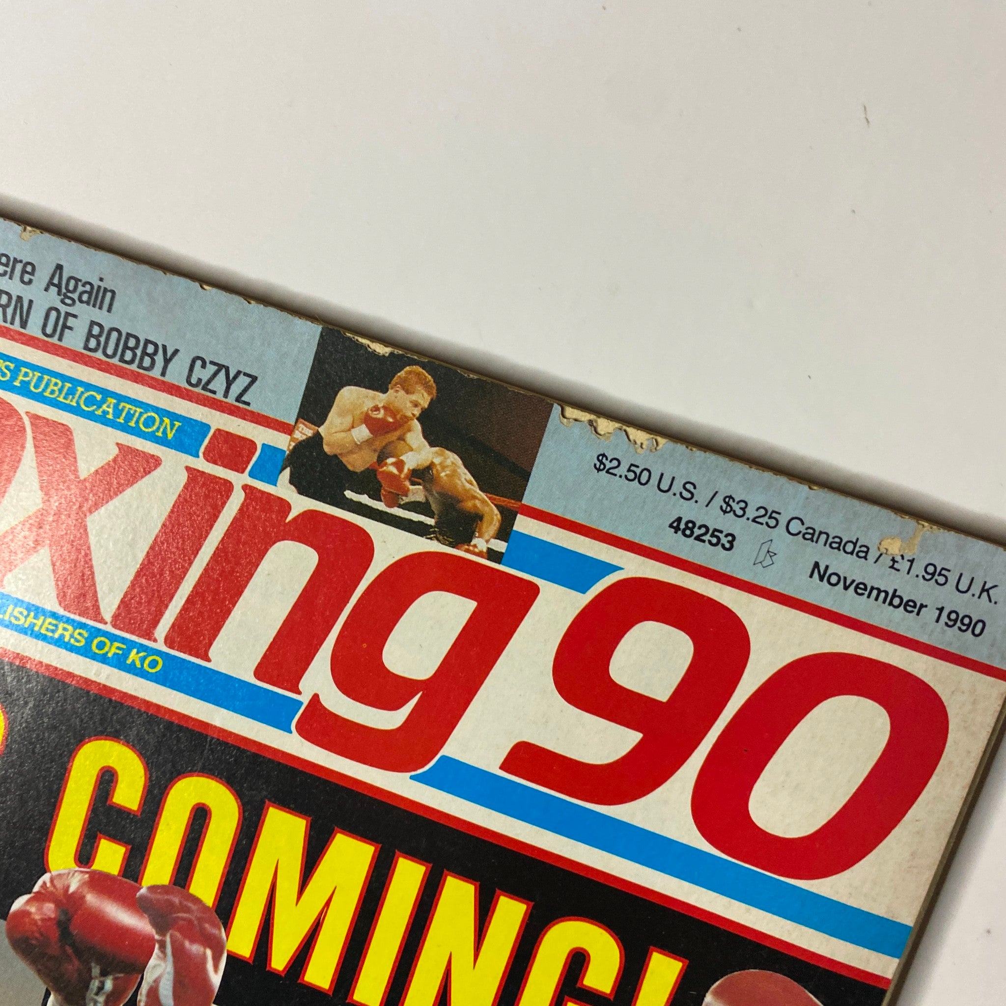 Cover of Boxing 90 Magazine, November 1990, featuring Mike Tyson and Donald Curry, including issue details and pricing.