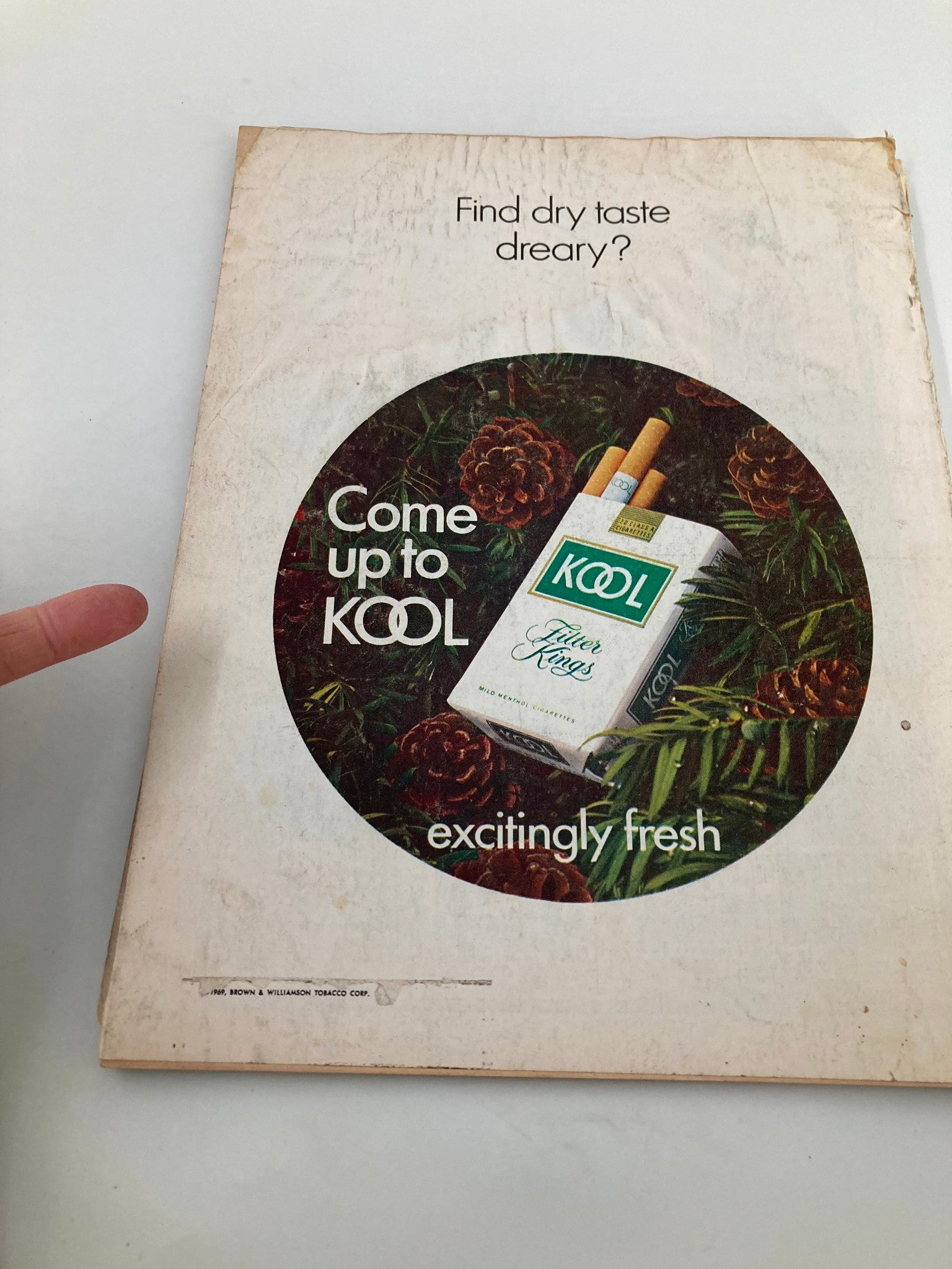 Back cover of TRUE The Man's Magazine January 1970, showcasing a vintage advertisement for Kool cigarettes with a winter theme.