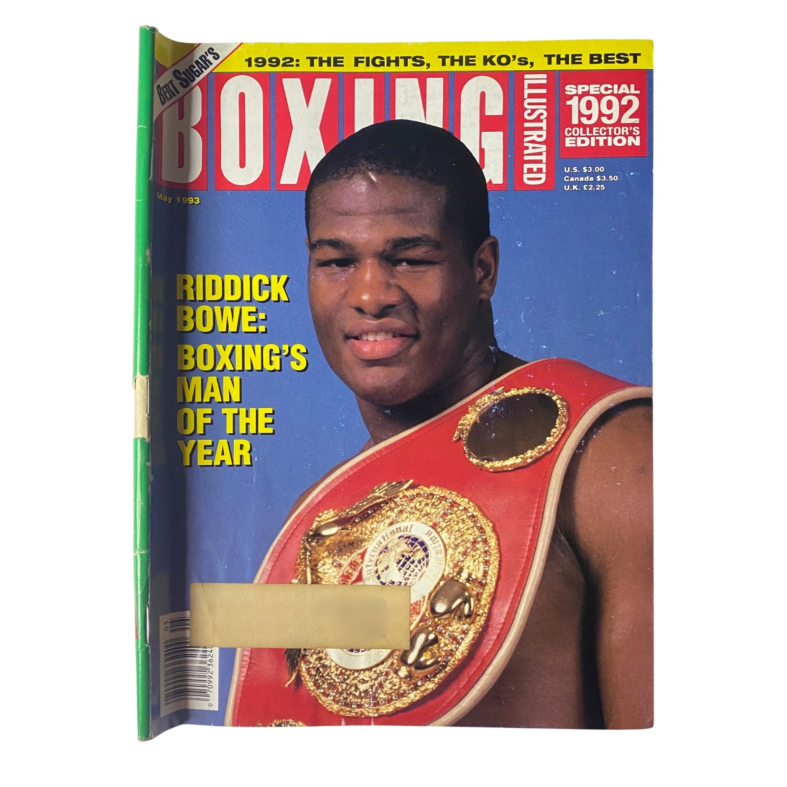 Boxing Illustrated Magazine May 1993 cover featuring Riddick Bowe, recognized as Boxing's Man of the Year, showcasing his championship belt.