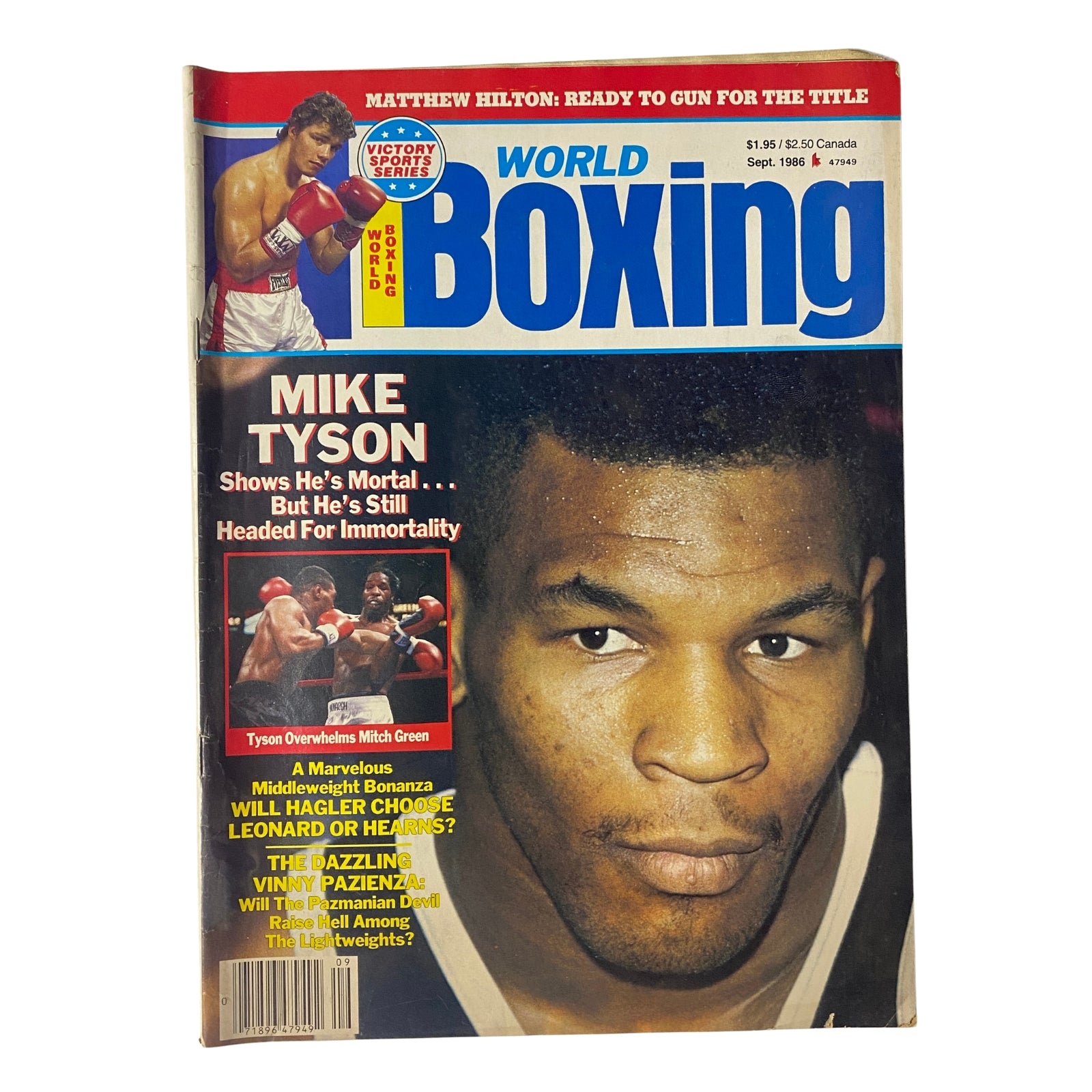 Cover of World Boxing Magazine September 1986 featuring Mike Tyson and Mitch Green, highlighting Tyson's resilience in the ring and showcasing articles on contemporary boxing topics.