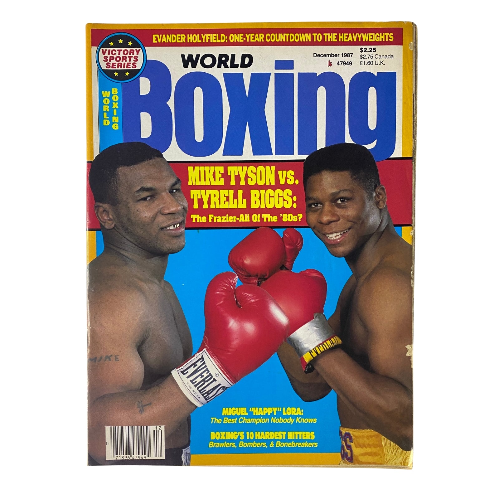World Boxing Magazine December 1987 issue featuring Mike Tyson vs. Tyrell Biggs on the cover, showcasing the iconic heavyweight matchup, with Tyson in boxing gloves and Biggs ready for action.