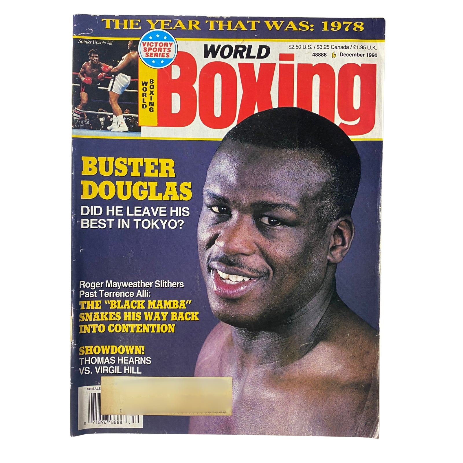 World Boxing Magazine December 1990 cover featuring Buster Douglas, highlighting his victory and questioning if he left his best performance in Tokyo. The issue also covers Roger Mayweather's comeback and classic boxing history.