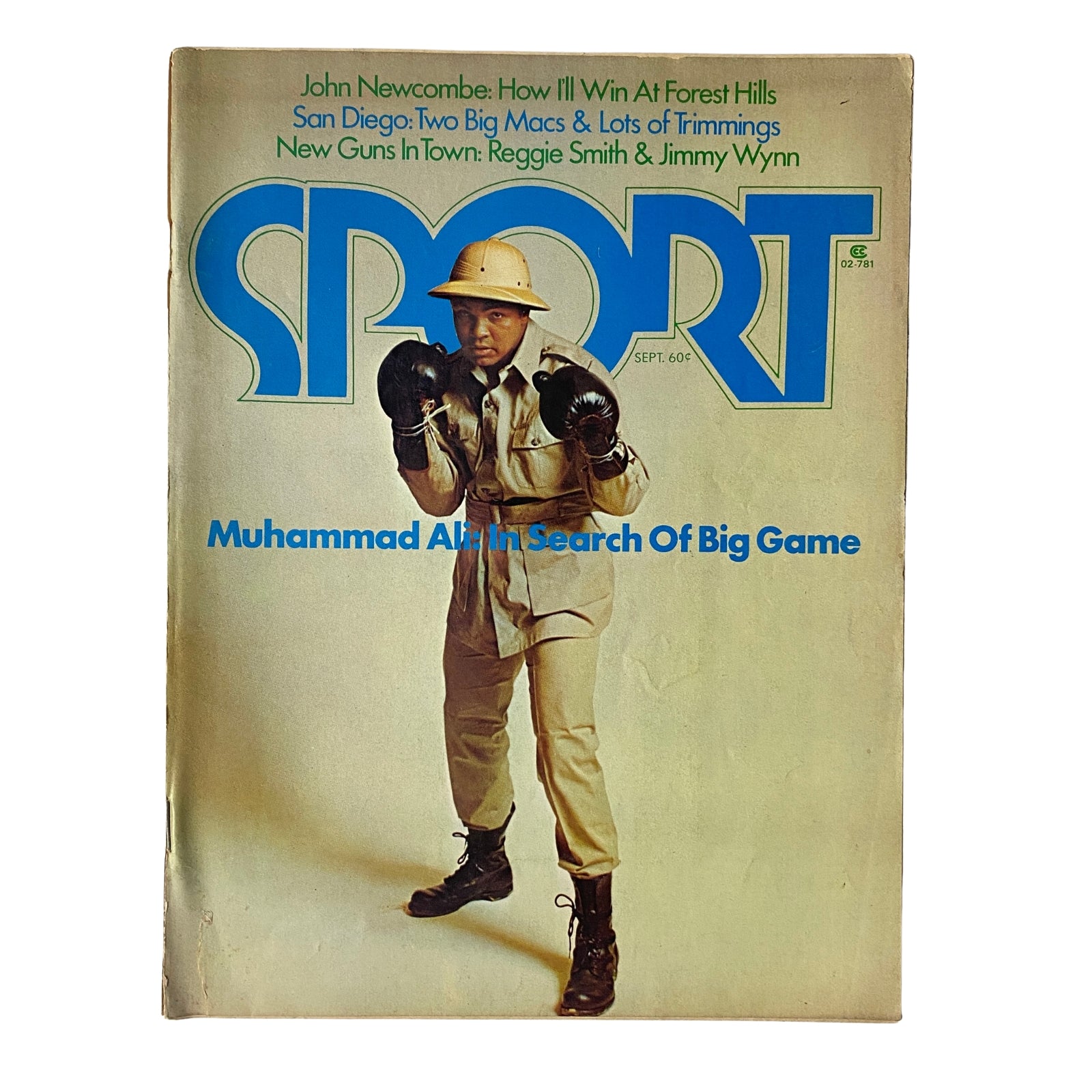 Sport Magazine September 1974 cover featuring Muhammad Ali in a boxing stance, showcasing articles on sports legends like John Newcombe and Reggie Smith.