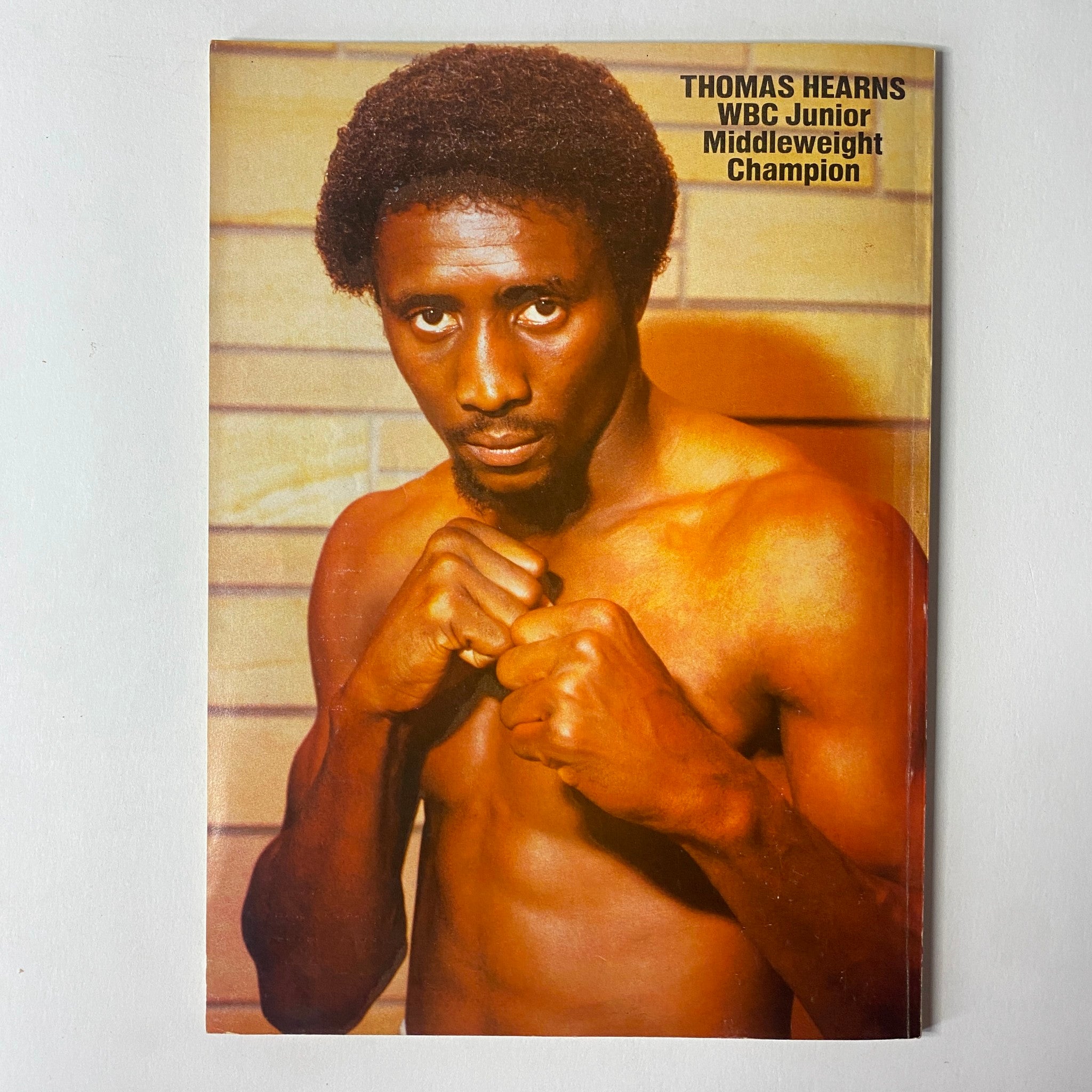 Inside Boxing Magazine November 1983 No. 1 Marvin Hagler Cover - Portrait of Thomas Hearns, WBC Junior Middleweight Champion, captured in a classic boxing pose. This image represents the boxing legends featured in the magazine's debut issue.