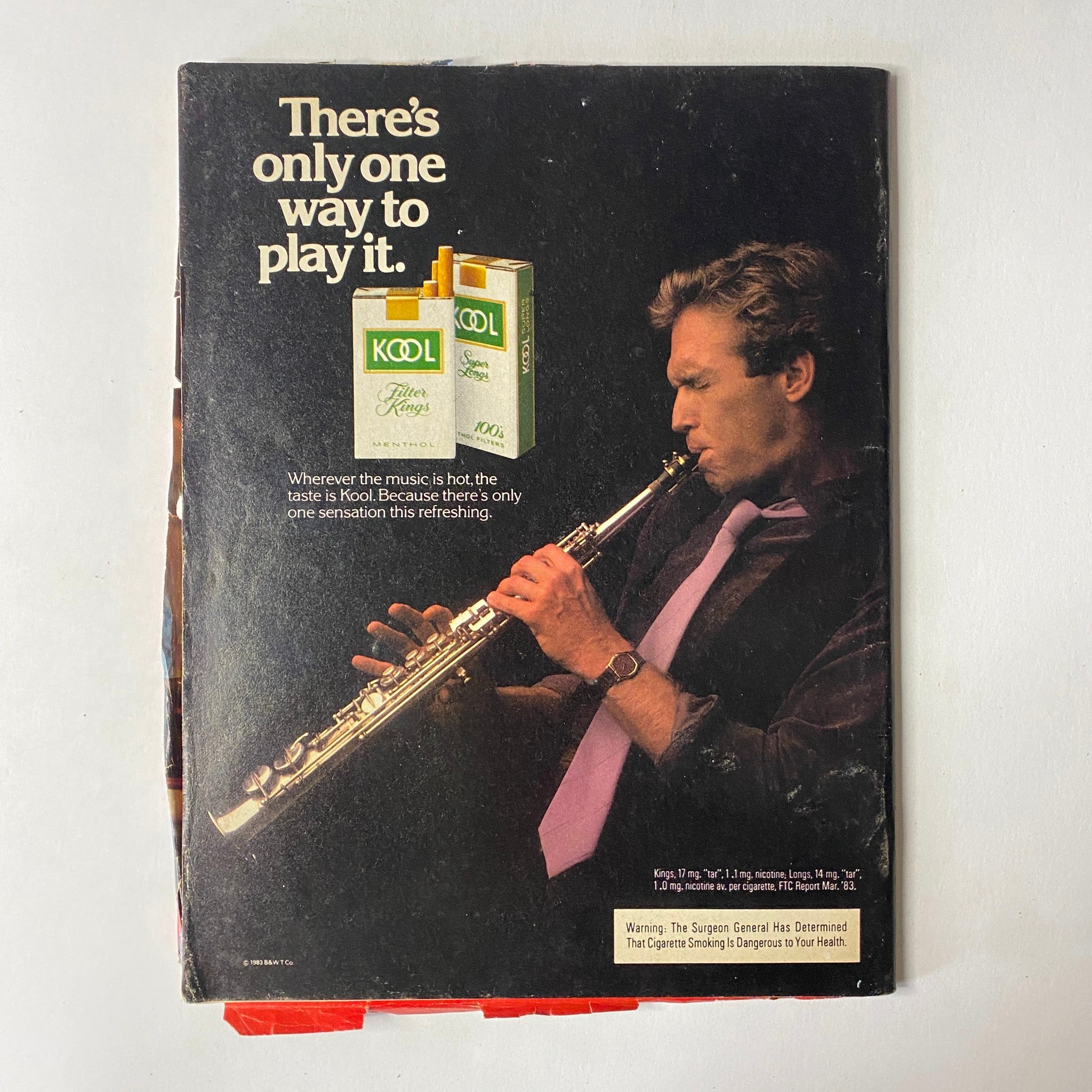 Back cover of The Ring Magazine May 1984 featuring an advertisement for Kool cigarettes with a musician playing the saxophone.