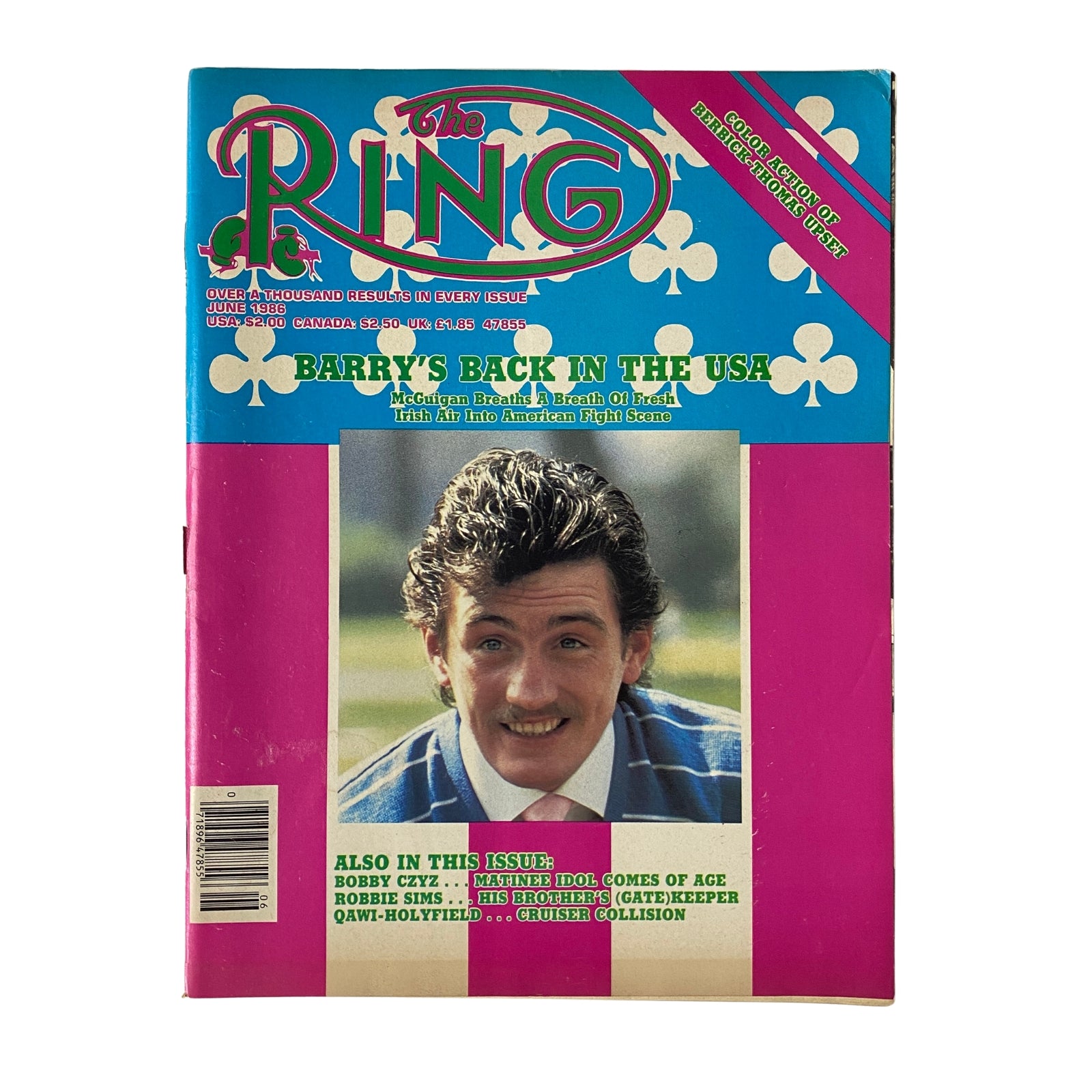 Cover of The Ring Magazine, June 1986, featuring Barry McGuigan with the headline 'Barry's Back in the USA.' Magenta and teal color scheme with boxing-themed graphics.