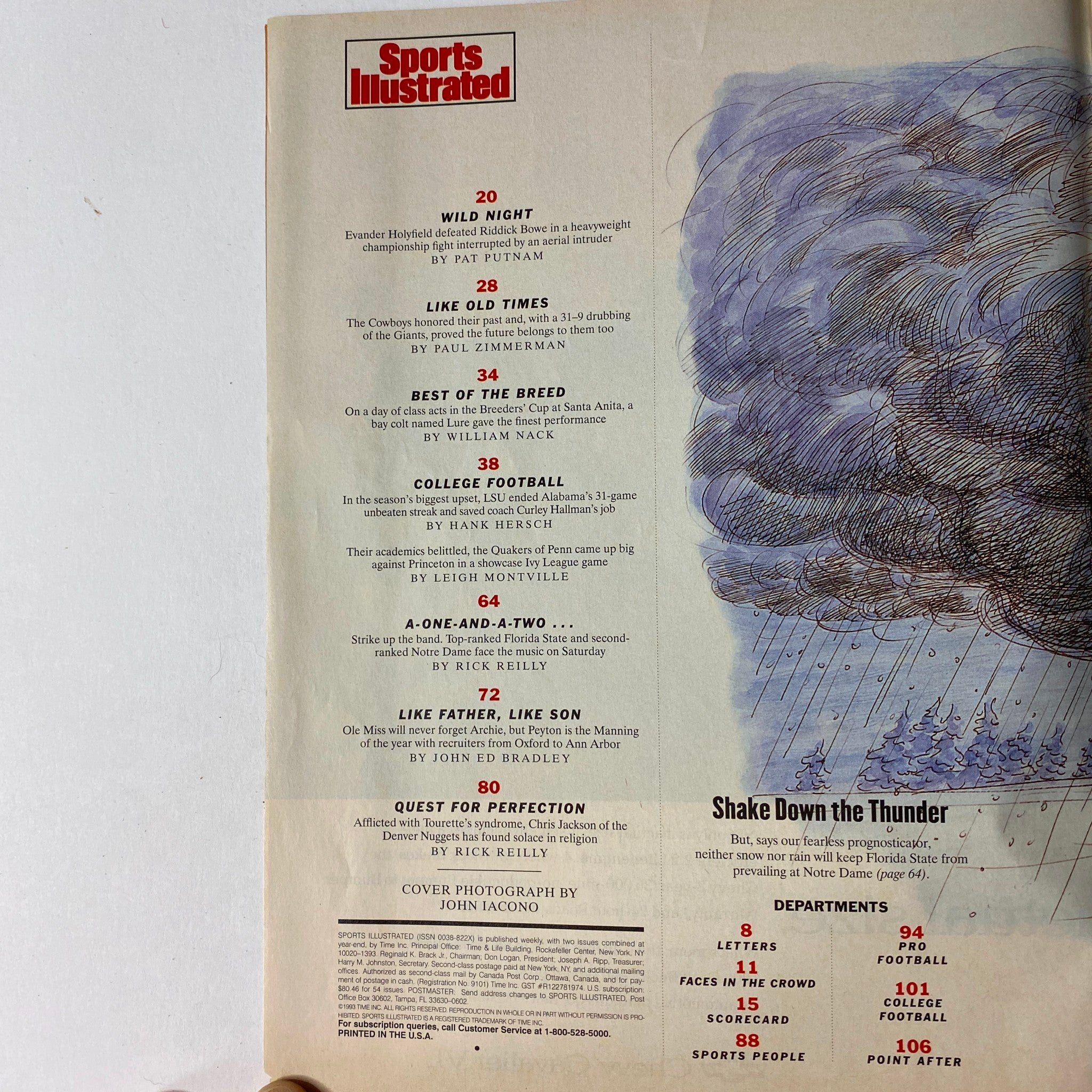 Contents page of Sports Illustrated Magazine, November 15, 1993, detailing articles including 'Wild Night' on Evander Holyfield's victory and featuring cover photograph by John Iacono.
