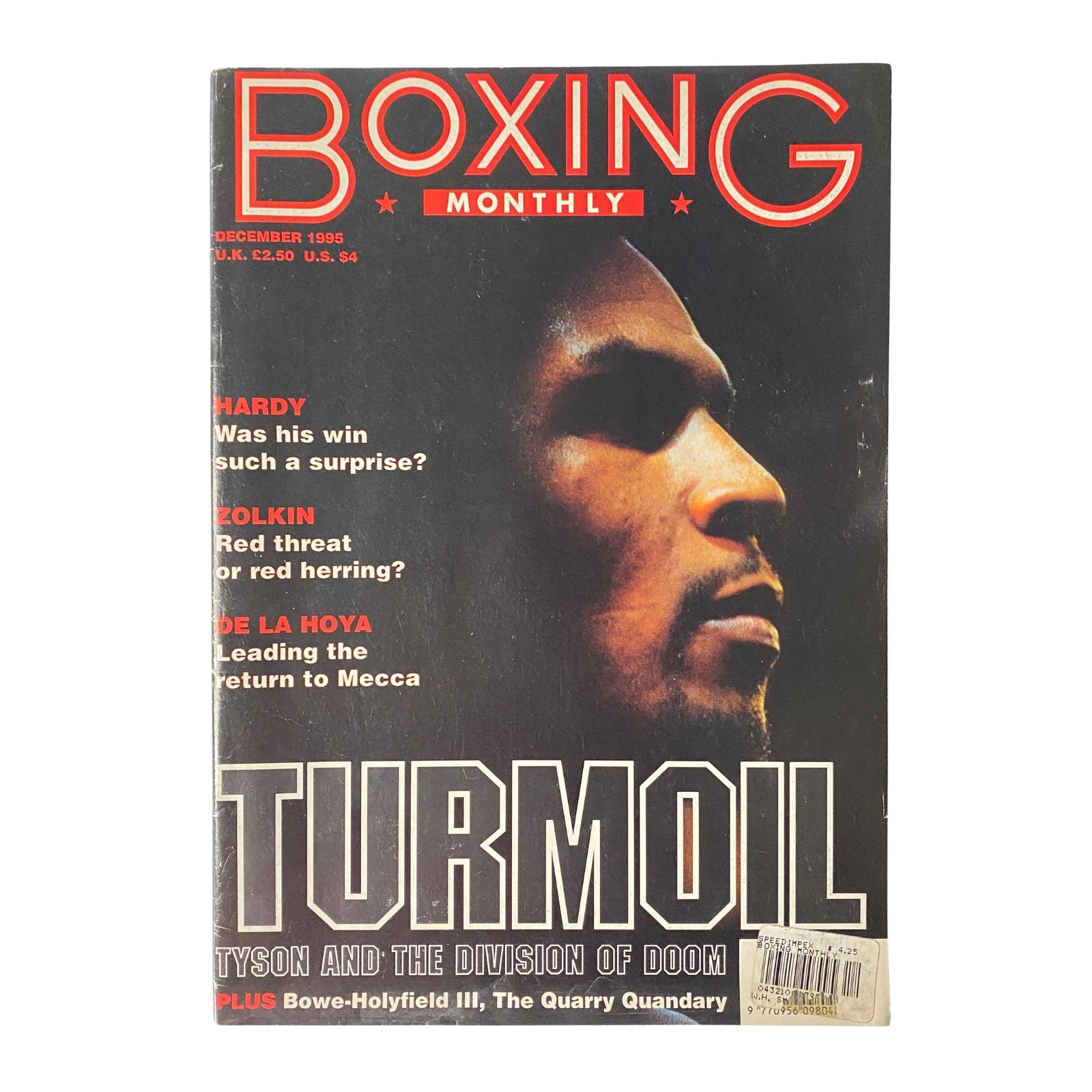 Cover of Boxing Monthly Magazine December 1995 featuring Mike Tyson, titled 'Turmoil: Tyson and the Division of Doom', highlighting boxing topics of the era.
