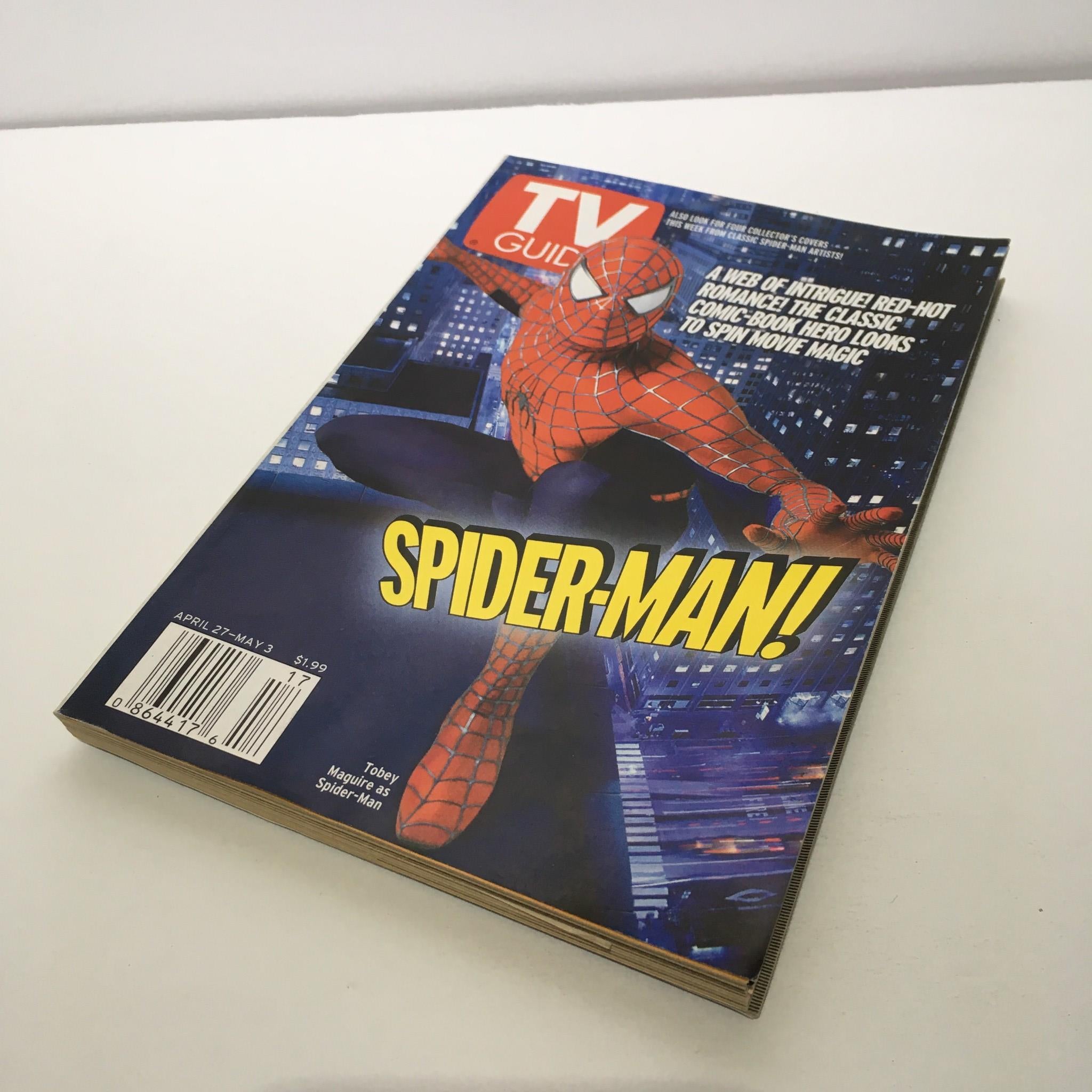 Cover of TV Guide, April 27-May 3 2002, featuring Spider-Man. The magazine showcases Tobey Maguire as Spider-Man, highlighting the superhero's iconic pose against a city backdrop. Perfect for collectors and fans of the Spider-Man movie franchise.