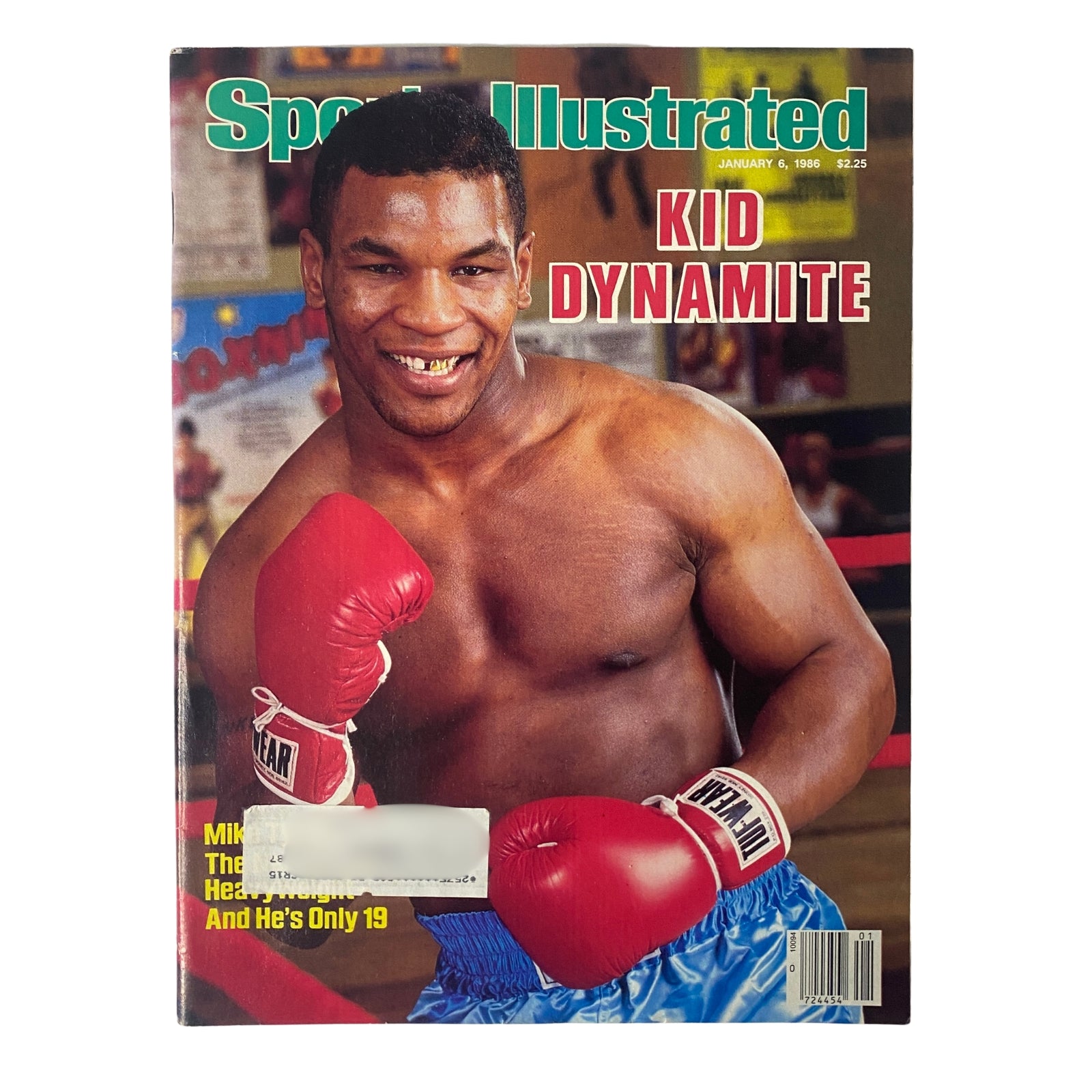 Cover of Sports Illustrated Magazine from January 6, 1986 featuring Mike Tyson, known as Kid Dynamite, showcasing his boxing skills at age 19.