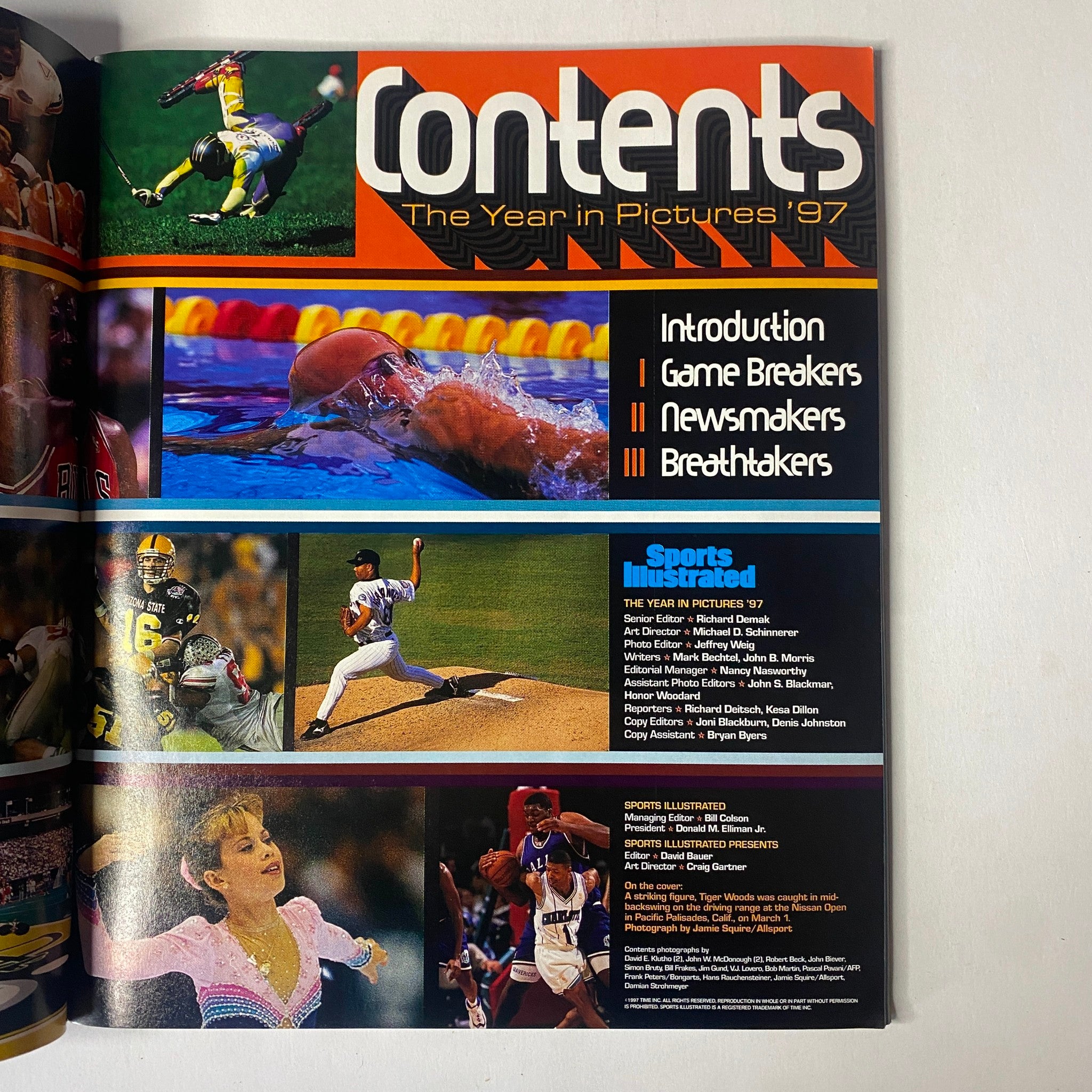 Table of contents page from Sports Illustrated Magazine - Tiger Woods YEAR IN PICTURES 1997, highlighting sections like Introduction, Game Breakers, Newsmakers, and Breathtakers with colorful images.