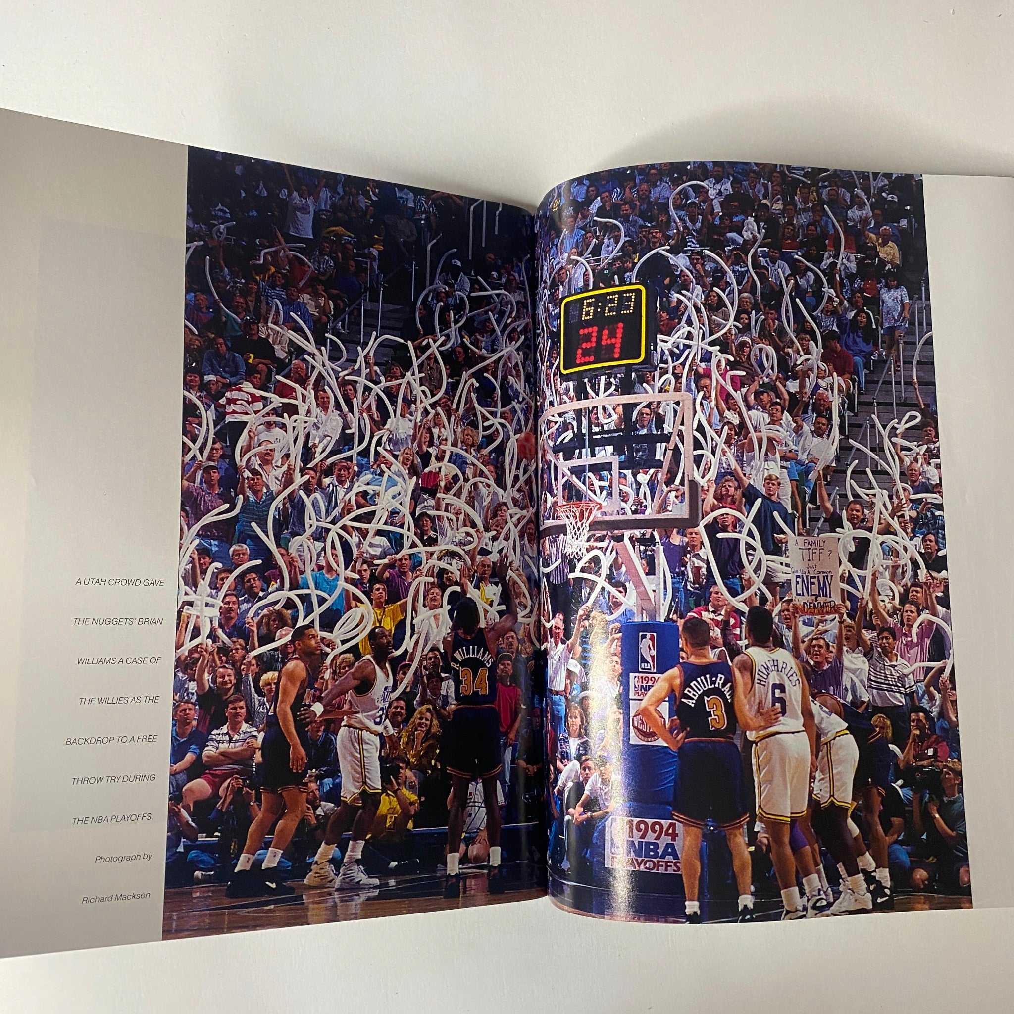 Sports Illustrated Magazine 1994 Year in Pictures showcasing an intense NBA Playoff moment with players on the court, reflecting the thrilling sports atmosphere of the season.