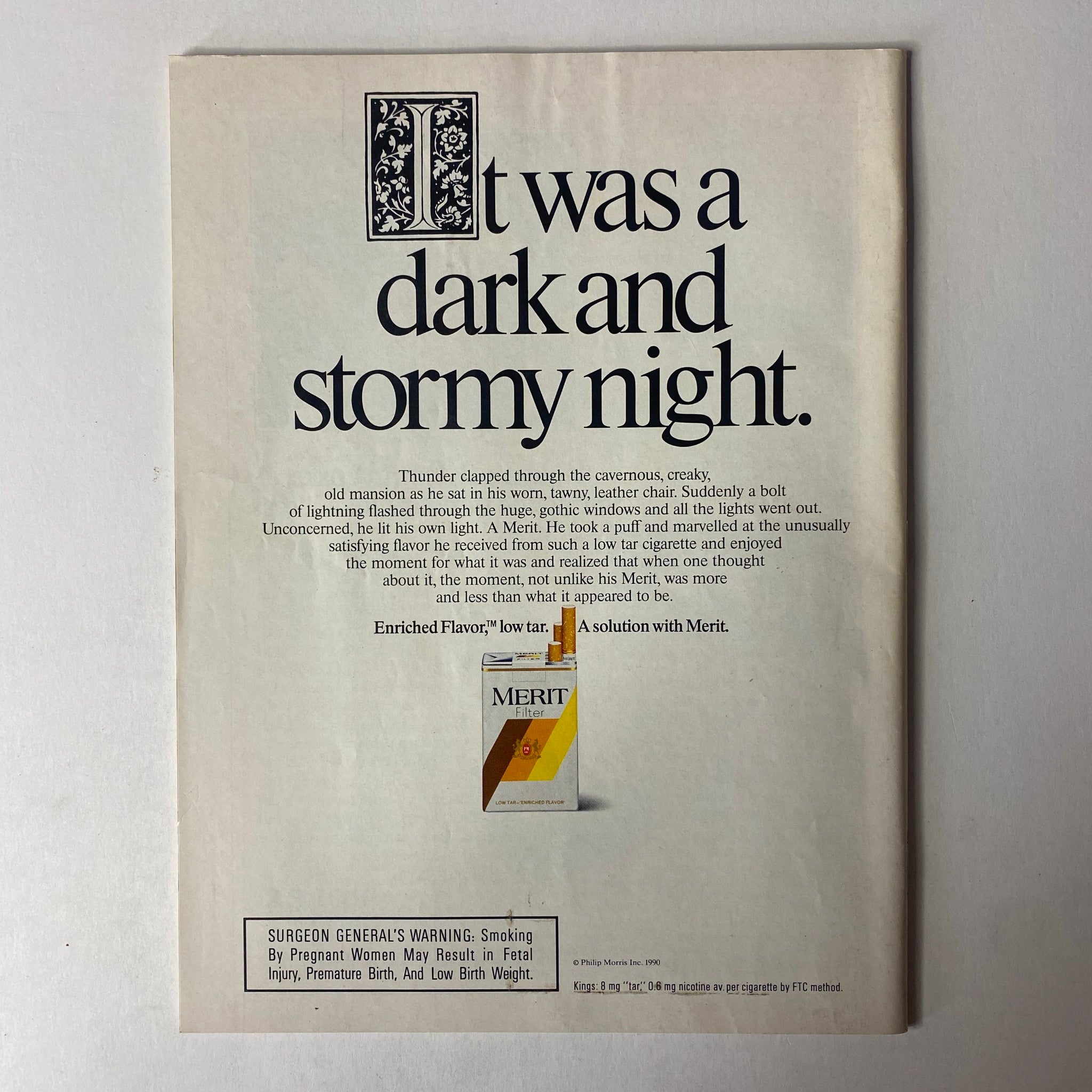 Advertisement page from Sports Illustrated Magazine May 14, 1990 showing 'It was a dark and stormy night' with a focus on Merit cigarettes.