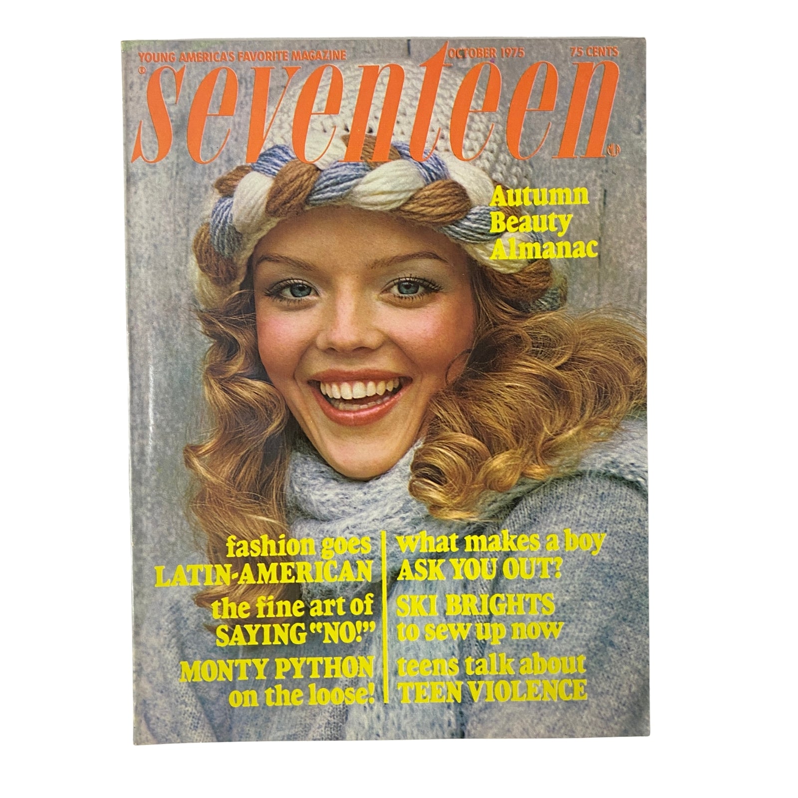 Cover of Seventeen Magazine October 1975 featuring the Autumn Beauty Almanac with a smiling model wearing a winter headband and showcasing fall fashion trends.