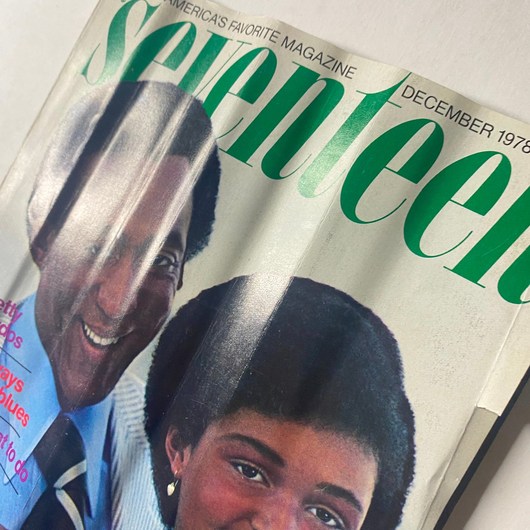 Close-up of the Seventeen Magazine December 1978 cover showing Bill Cosby and Erika Cosby, emphasizing festive hairstyles and seasonal articles.