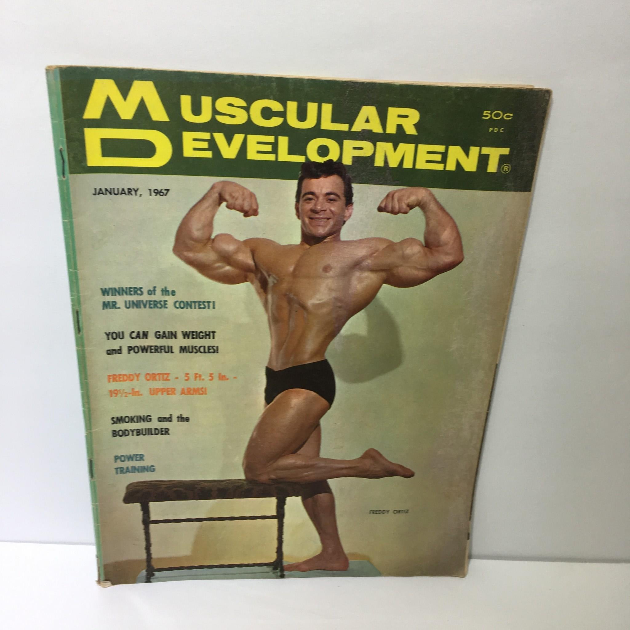 Cover of Muscular Development Magazine featuring Freddy Ortiz, January 1967. The magazine showcases Ortiz in a bodybuilding pose, highlighting fitness culture and bodybuilding tips from the era.