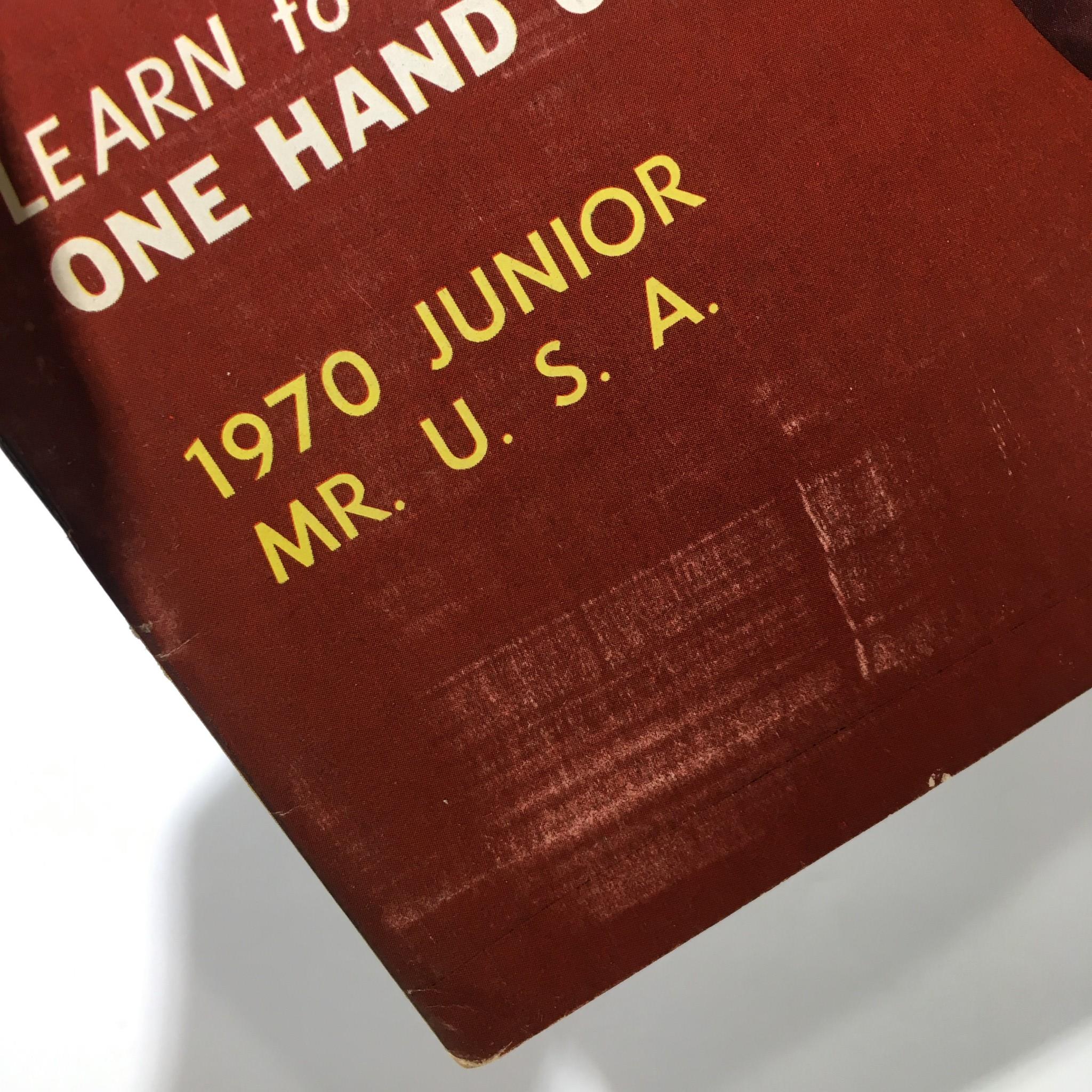 1970 Junior Mr. U.S.A. title displayed on the back cover of the Muscular Development Magazine, emphasizing competitive bodybuilding's historical significance.