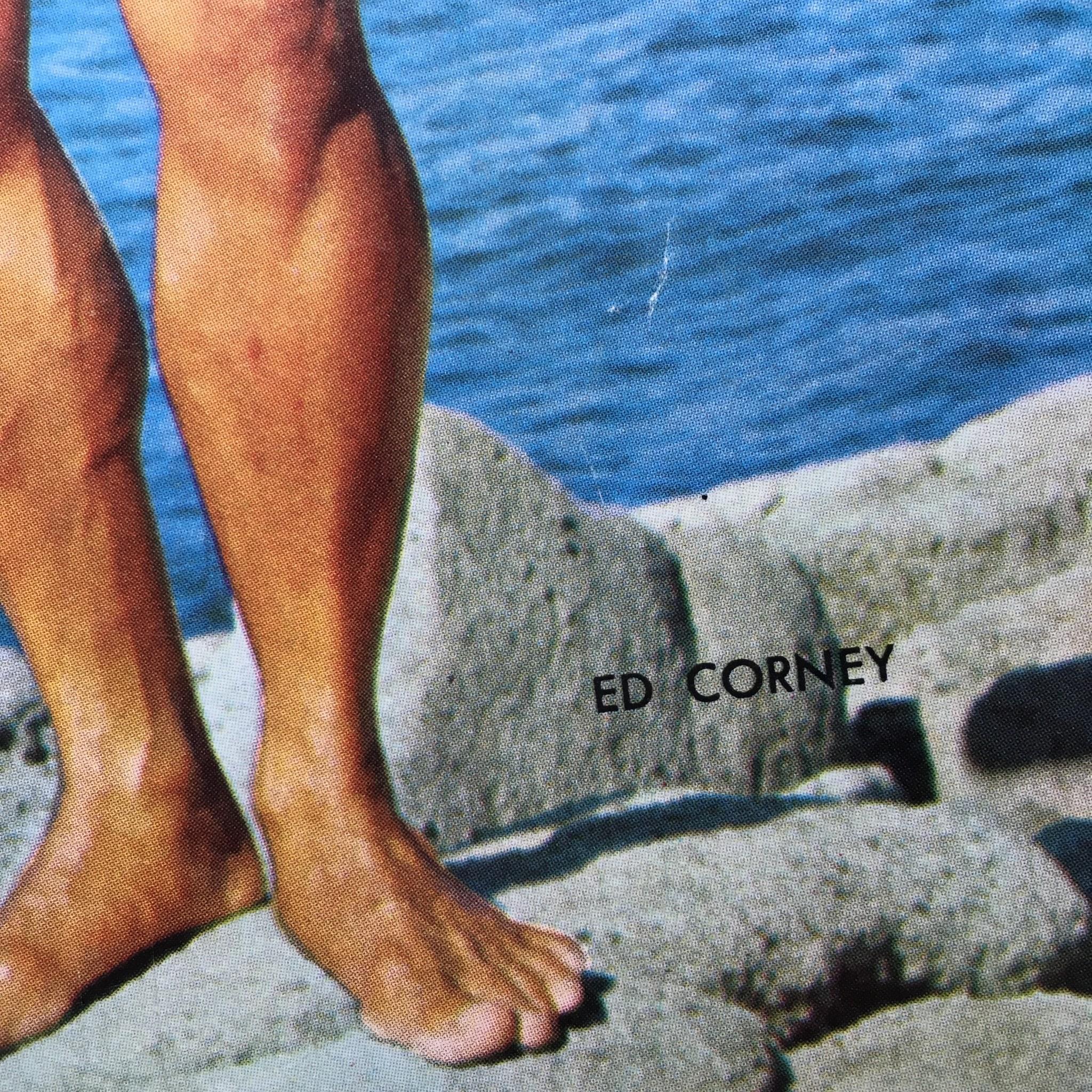 Detailed view of Ed Corney's legs featured in Muscular Development Magazine December 1970, highlighting his athletic build.