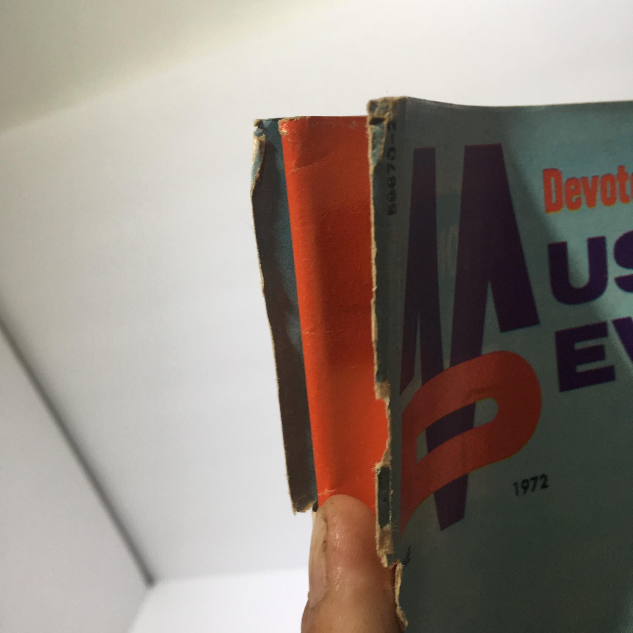 Side view of Muscular Development Magazine, June 1972, highlighting its condition with minor wear, ideal for collectors.