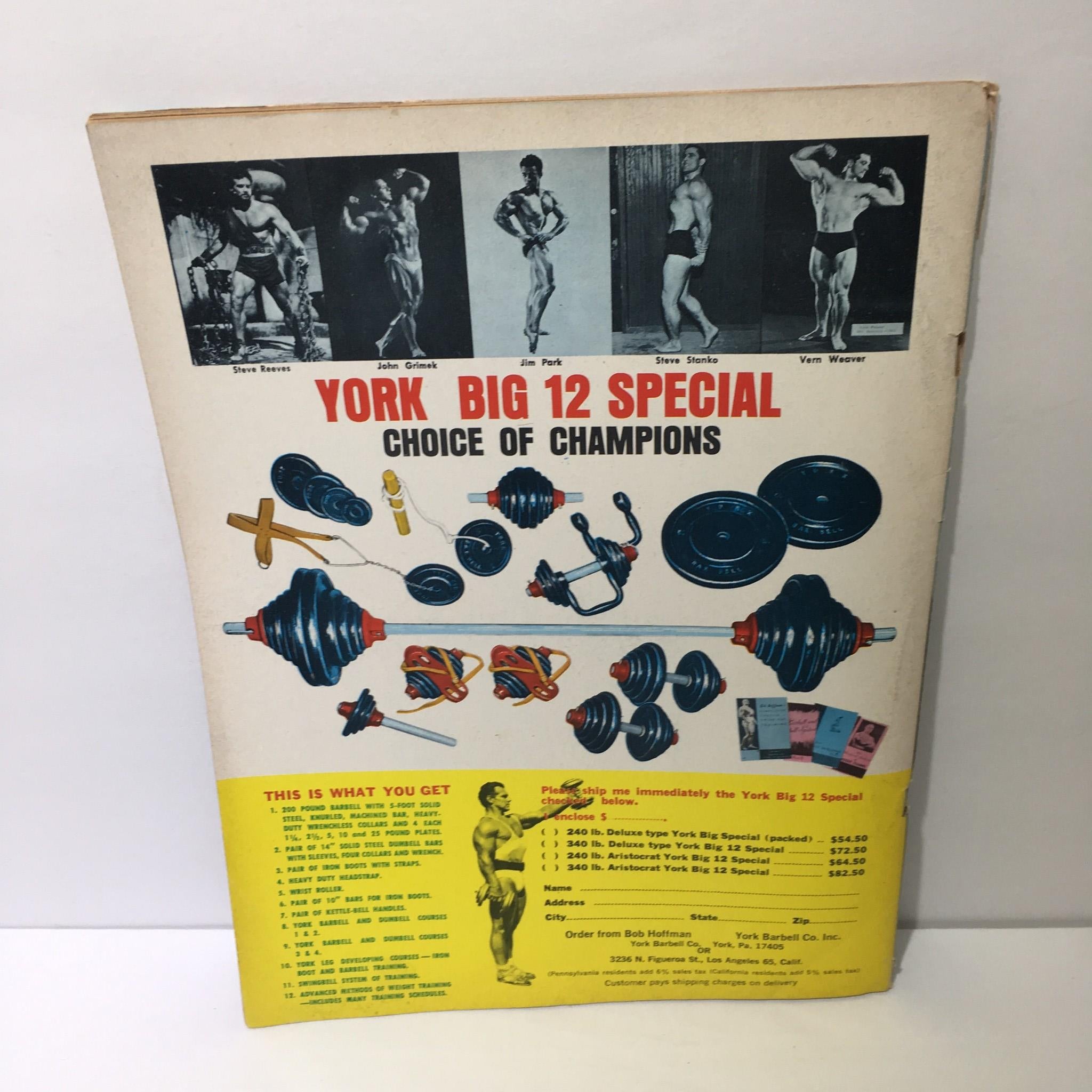 Back cover of Muscular Development Magazine featuring the York Big 12 Special, showcasing various weightlifting equipment and images of bodybuilders such as Steve Reeves and John Grimek.
