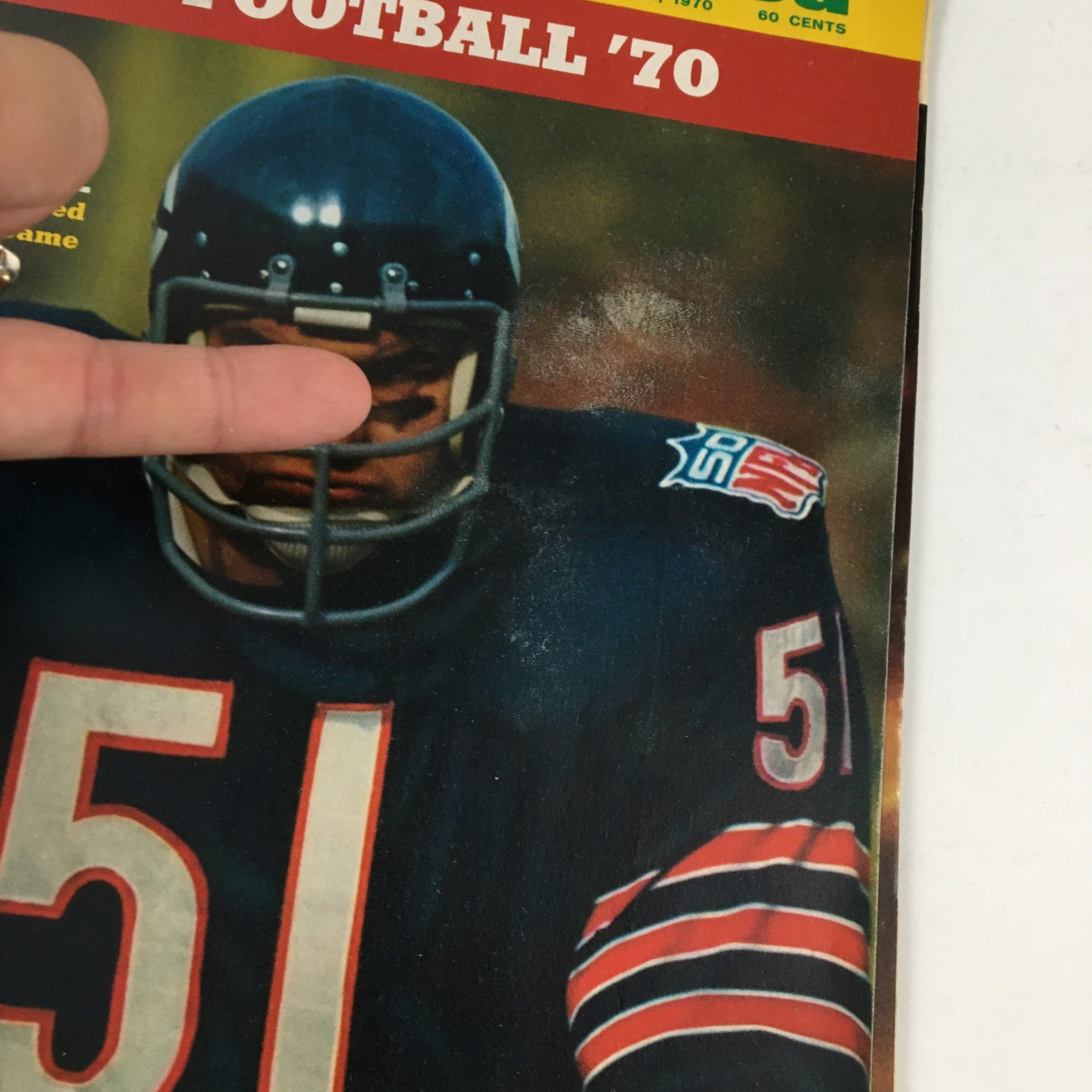 Close-up view of the cover of Sports Illustrated Magazine September 21 1970 highlighting Dick Butkus of the Bears, showcasing his iconic number 51 and the magazine title.