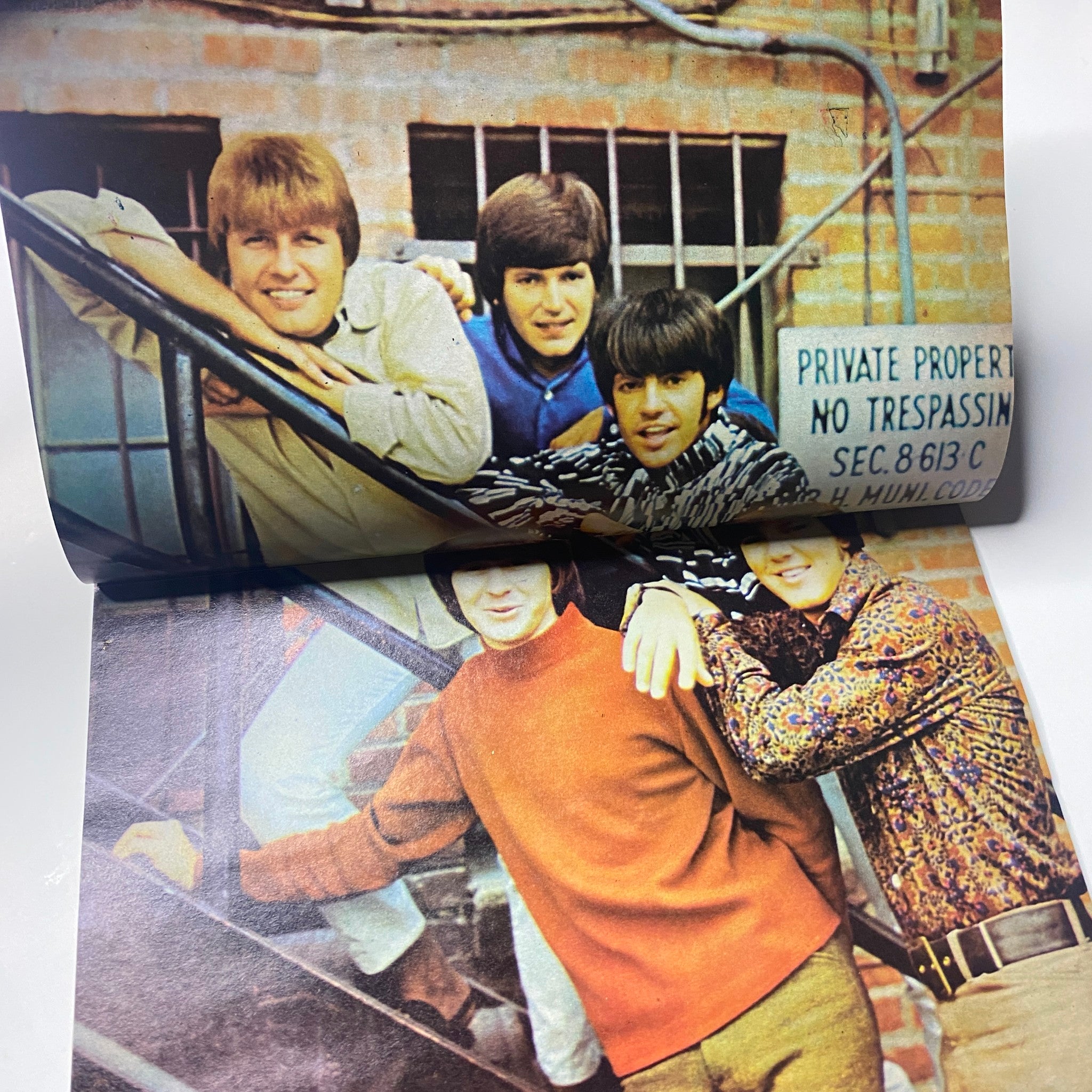 Fold-out poster from Teen Screen Magazine April 1968 Vol 10 No. 4, displaying The Monkees in a casual setting, highlighting their popularity in the 1960s.