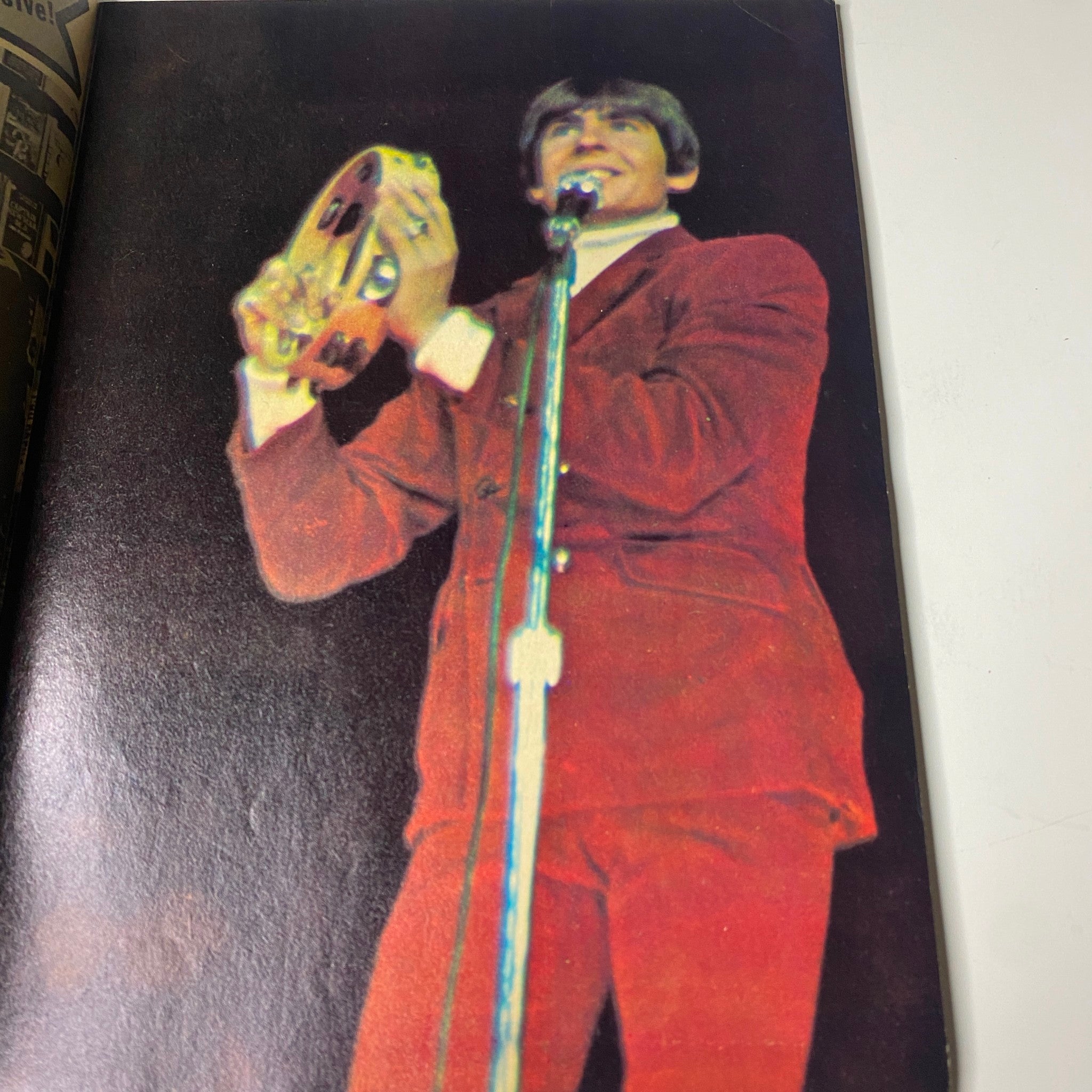 Full-color image of Davy Jones performing with a tambourine in Teen Screen Magazine March 1968.