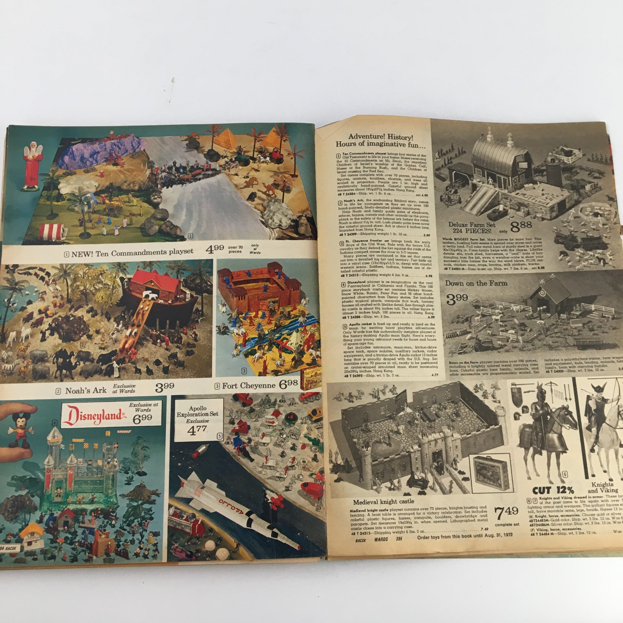 1971 Montgomery Ward Raggedy Dolls Christmas Price Guide Catalog displaying playsets including the Ten Commandments playset and Noah's Ark, alongside related prices and illustrations.